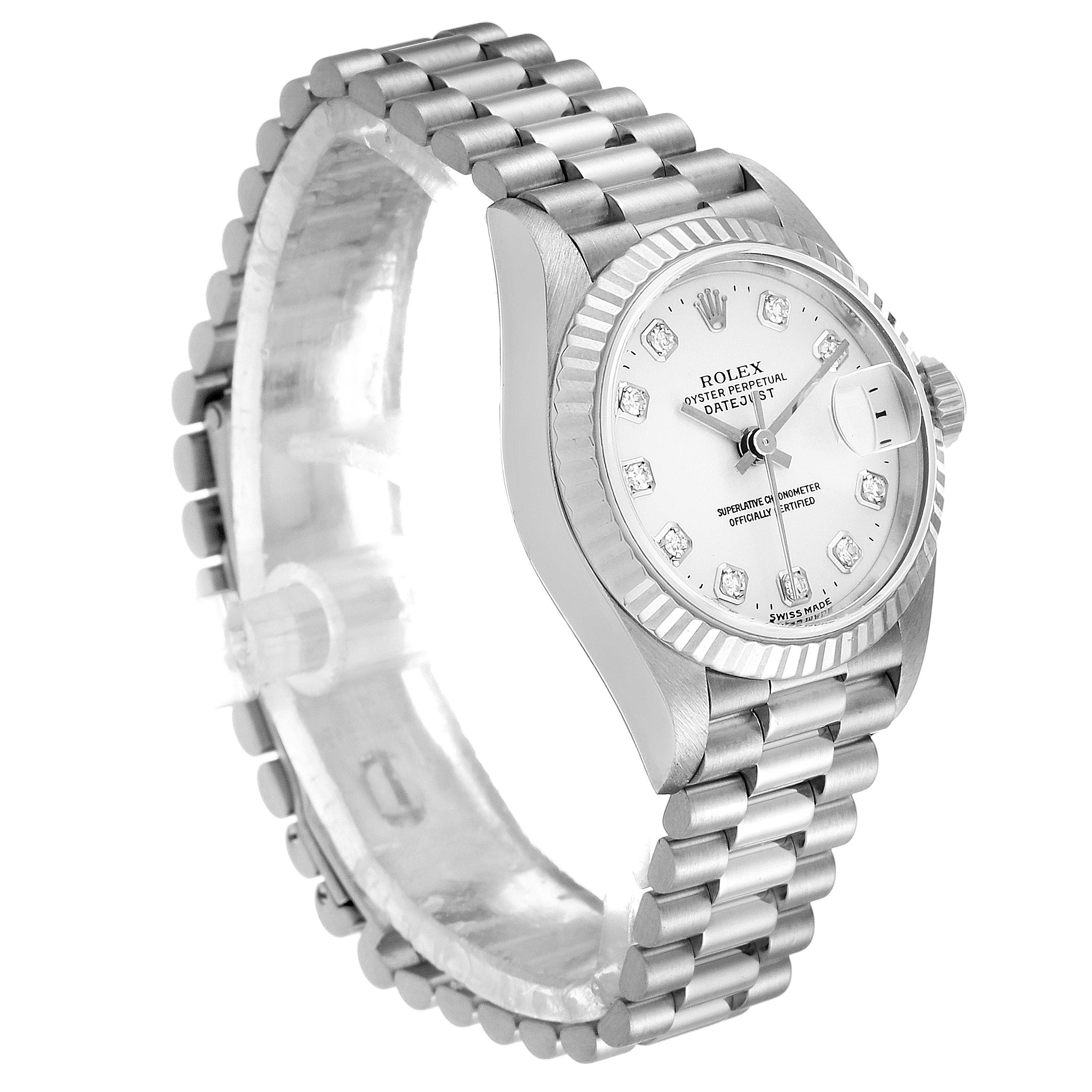 The image shows a side view of a Rolex President 79179 Women's White Gold Silver Dial 79179 Women's White Gold Silver Dial model watch, highlighting its bracelet, case, crown, and dial with diamond markers.