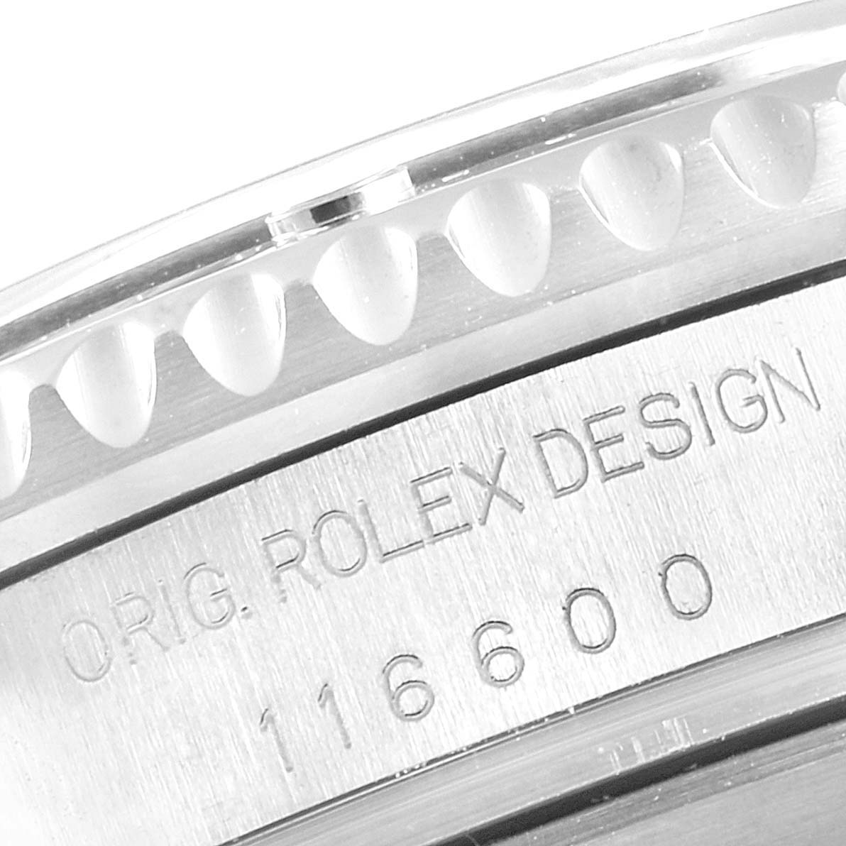 The image shows a close-up of the side of a Rolex Sea-Dweller 116600 Men
s Stainless Steel Black Dial 116600 Men
s Stainless Steel Black Dial watch, highlighting the bezel and engraved model number "116600."