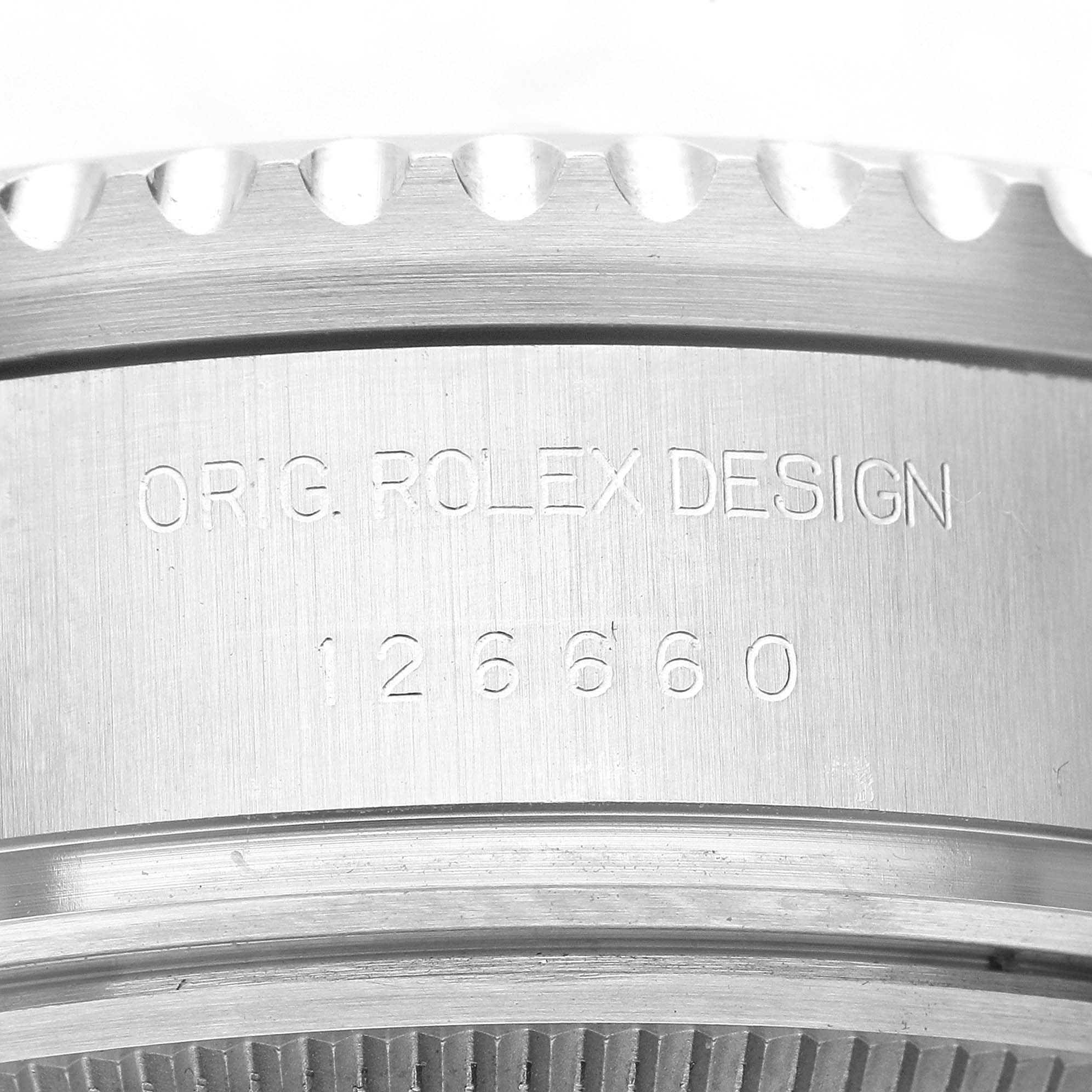 This image shows a close-up of the case back edge and model number engraving on a Rolex Sea-Dweller 126660 Men
s Stainless Steel Black Dial 126660 Men
s Stainless Steel Black Dial watch.