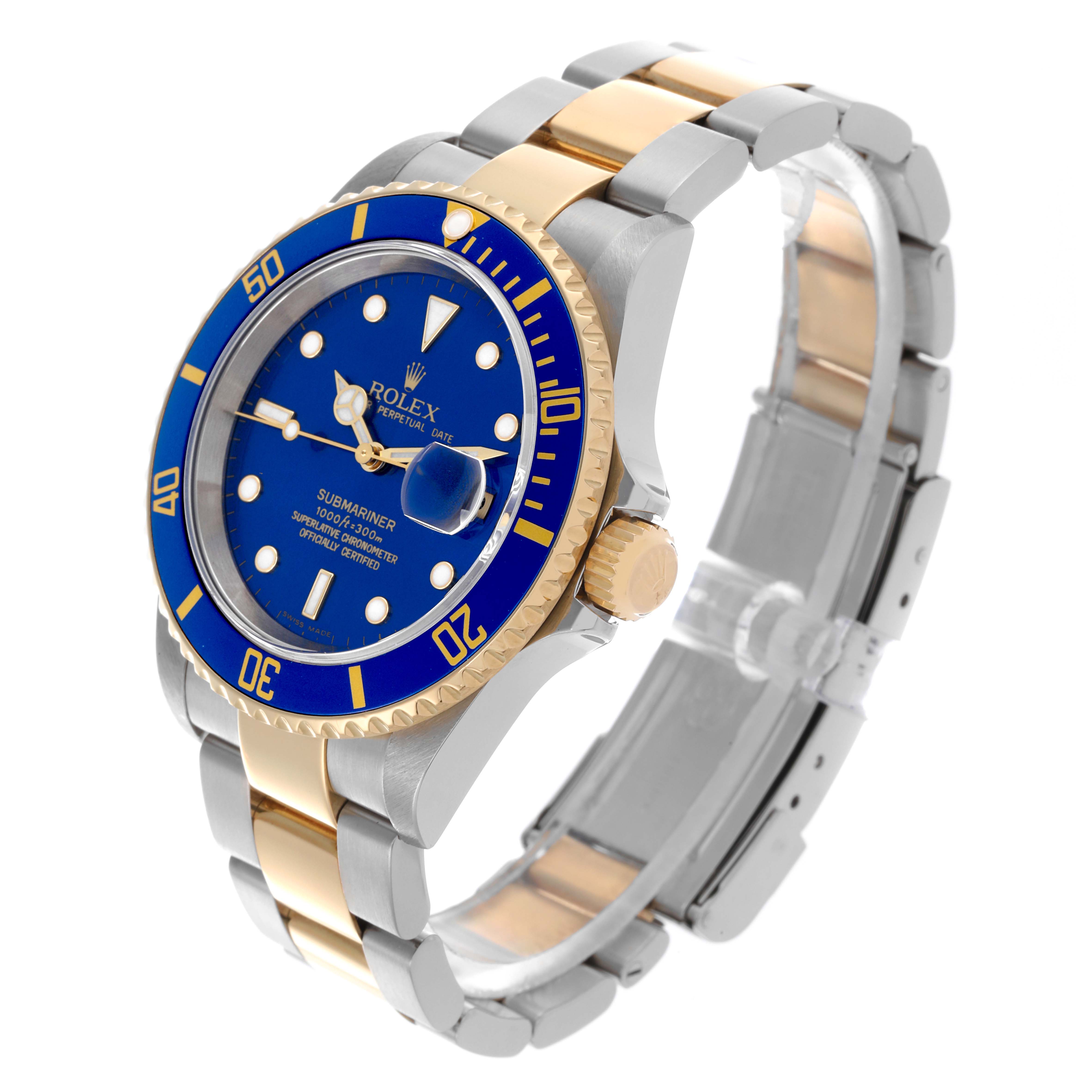 The Rolex Submariner 16613 Men's Steel and Gold (two tone) Blue Dial 16613 Men's Steel and Gold (two tone) Blue Dial watch is shown at a three-quarter angle highlighting the bezel, dial, crown, and bracelet.