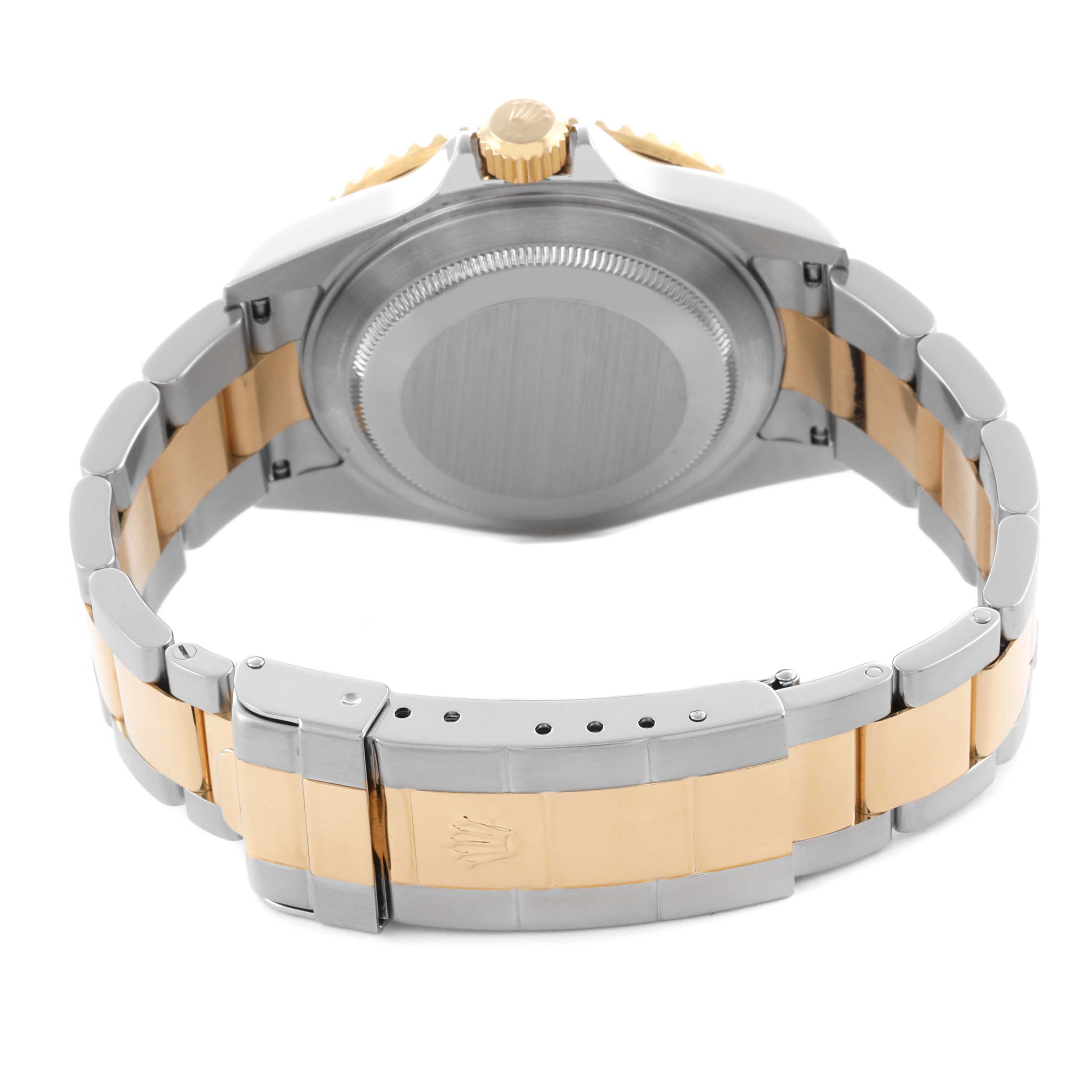 The image shows the back view of a Rolex Submariner 16613 Men's Steel and Gold (two tone) Blue Dial 16613 Men's Steel and Gold (two tone) Blue Dial, highlighting the case back, crown, and two-tone bracelet.