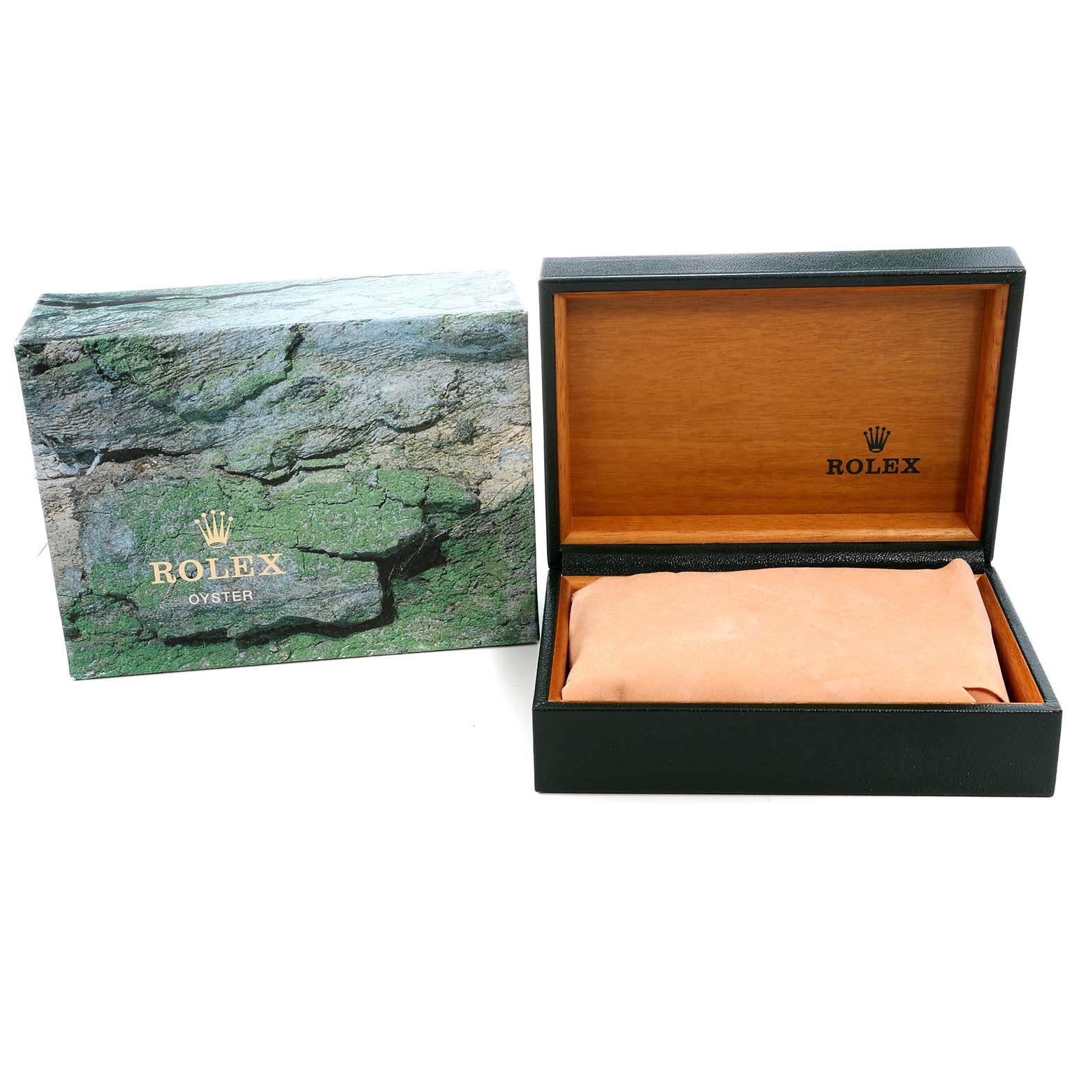 The image shows a Rolex Submariner 14060 Men's Stainless Steel Black Dial box and cushion from an angled top view, displaying the exterior and interior designs.