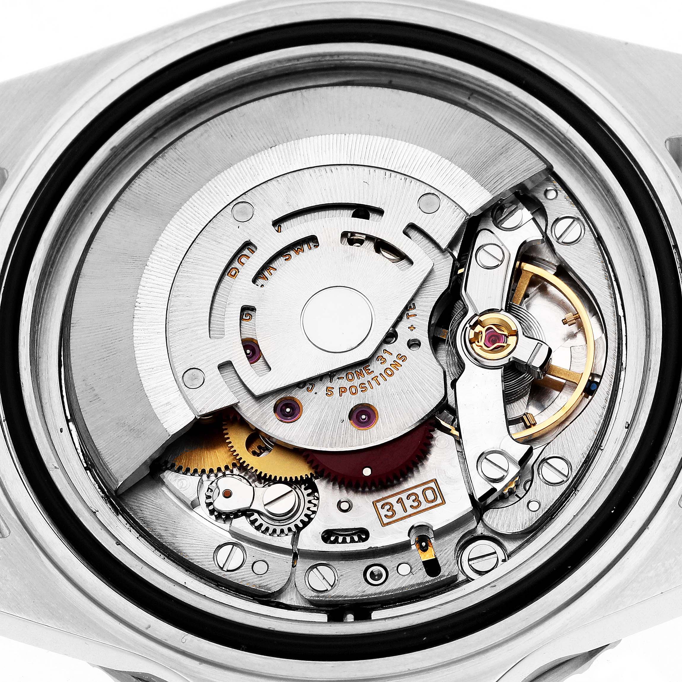 The image shows the internal movement of a Rolex Submariner 14060 Men's Stainless Steel Black Dial, highlighting its detailed mechanical components.