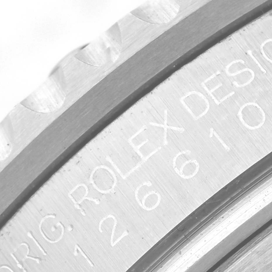 This close-up image shows the engraved text on the side of the bezel of a Rolex Submariner 126610LV Men
s Stainless Steel Black Dial 126610LV Men
s Stainless Steel Black Dial watch.