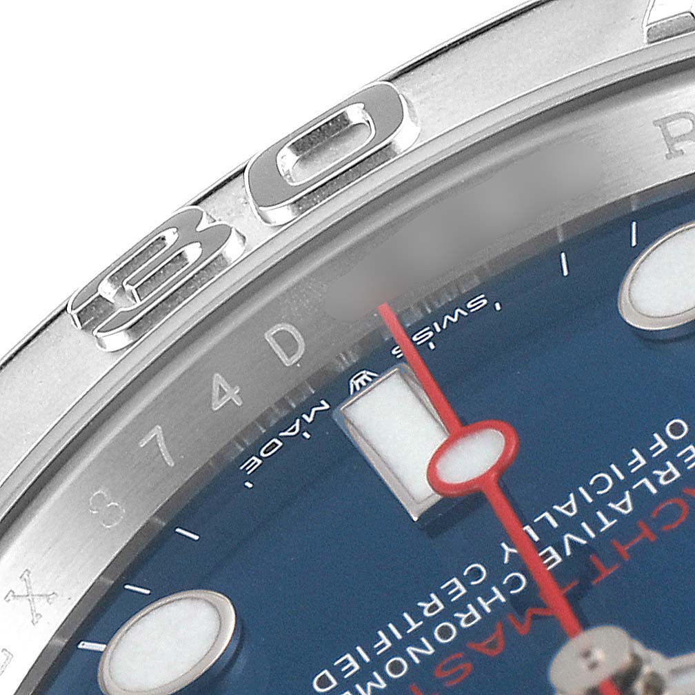 This close-up of the Rolex Yacht-Master 126622 Men
s Stainless Steel Blue Dial 126622 Men
s Stainless Steel Blue Dial shows part of the blue dial, red second hand, and the bezel with the number "40."
