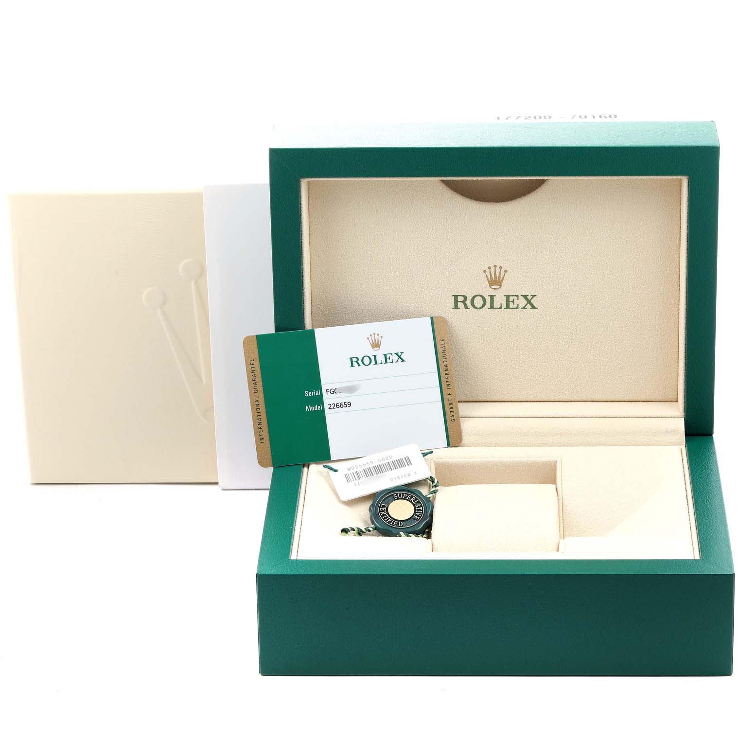 This image shows the packaging, warranty card, tag, and box of a Rolex Yacht-Master 226659 Men
s Stainless Steel Black Dial 226659 Men
s Stainless Steel Black Dial watch.