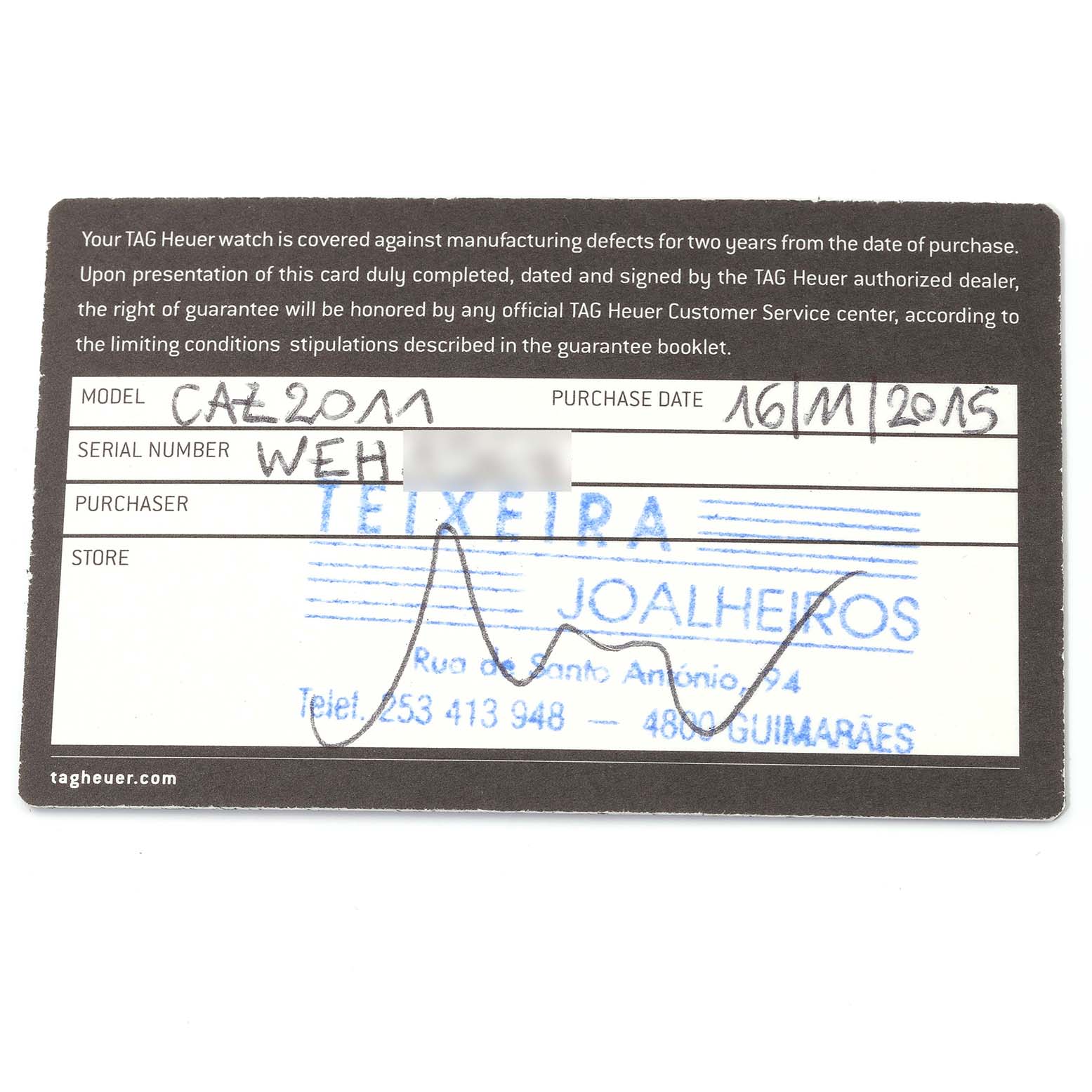 This image shows the guarantee card for a Tag Heuer Formula 1 CAZ2011-1 Men's Stainless Steel Black Dial CAZ2011-1 Men's Stainless Steel Black Dial model CAZ2011, displaying serial number, purchase date, and store details.