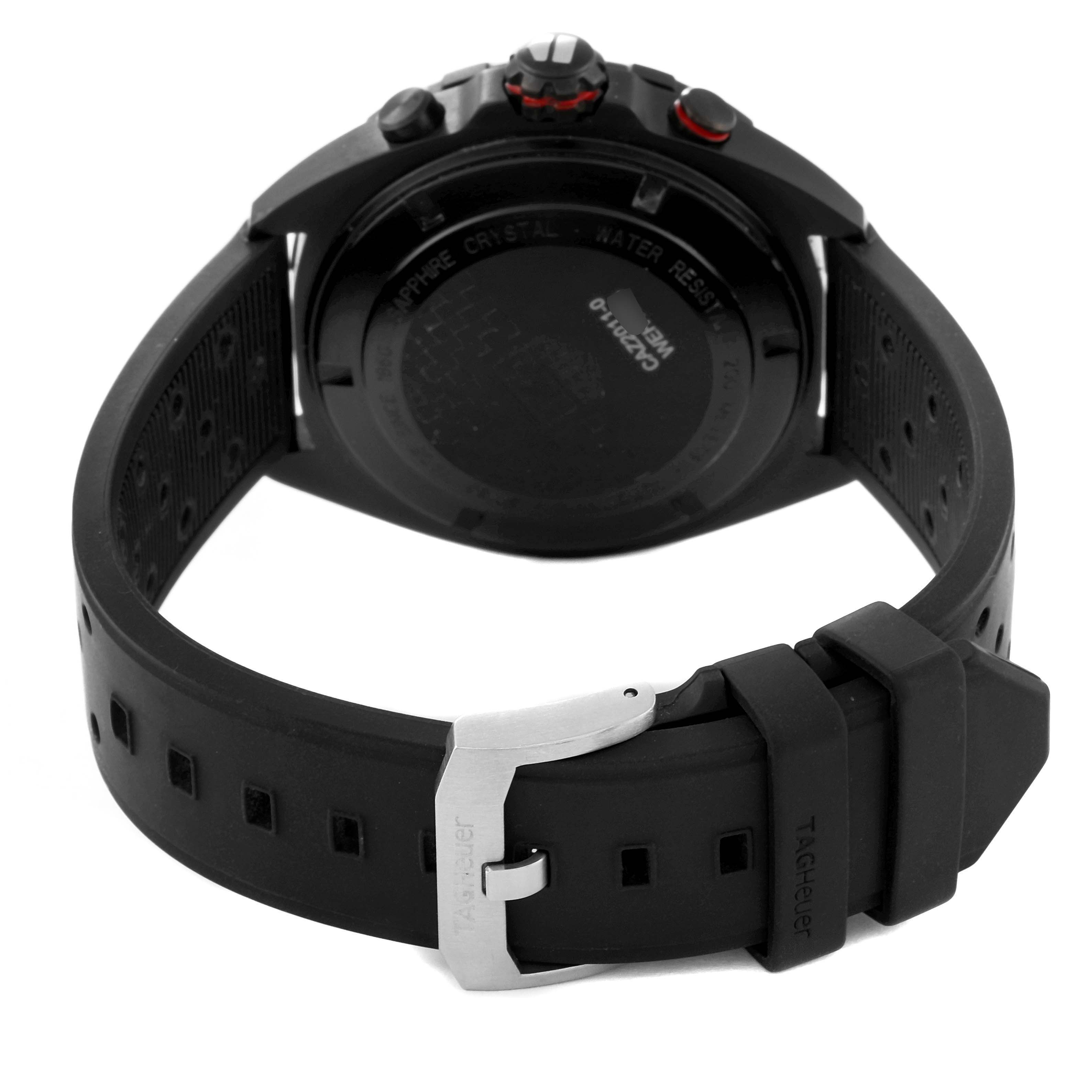 The image shows the back view of a Tag Heuer Formula 1 CAZ2011-1 Men's Stainless Steel Black Dial CAZ2011-1 Men's Stainless Steel Black Dial watch, featuring its strap, buckle, and case back.