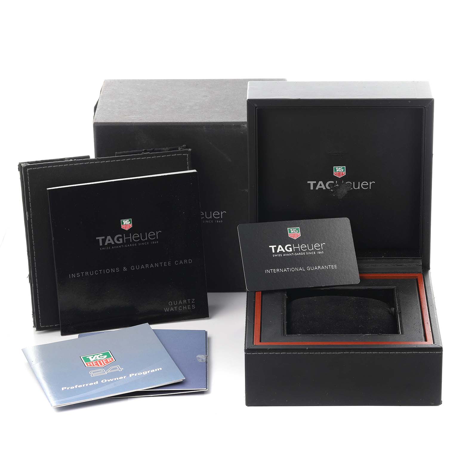 The image shows a Tag Heuer Monaco WW2110.FC6177 Men's Stainless Steel Black Dial WW2110.FC6177 Men's Stainless Steel Black Dial watch box, instruction booklets, and an international guarantee card.