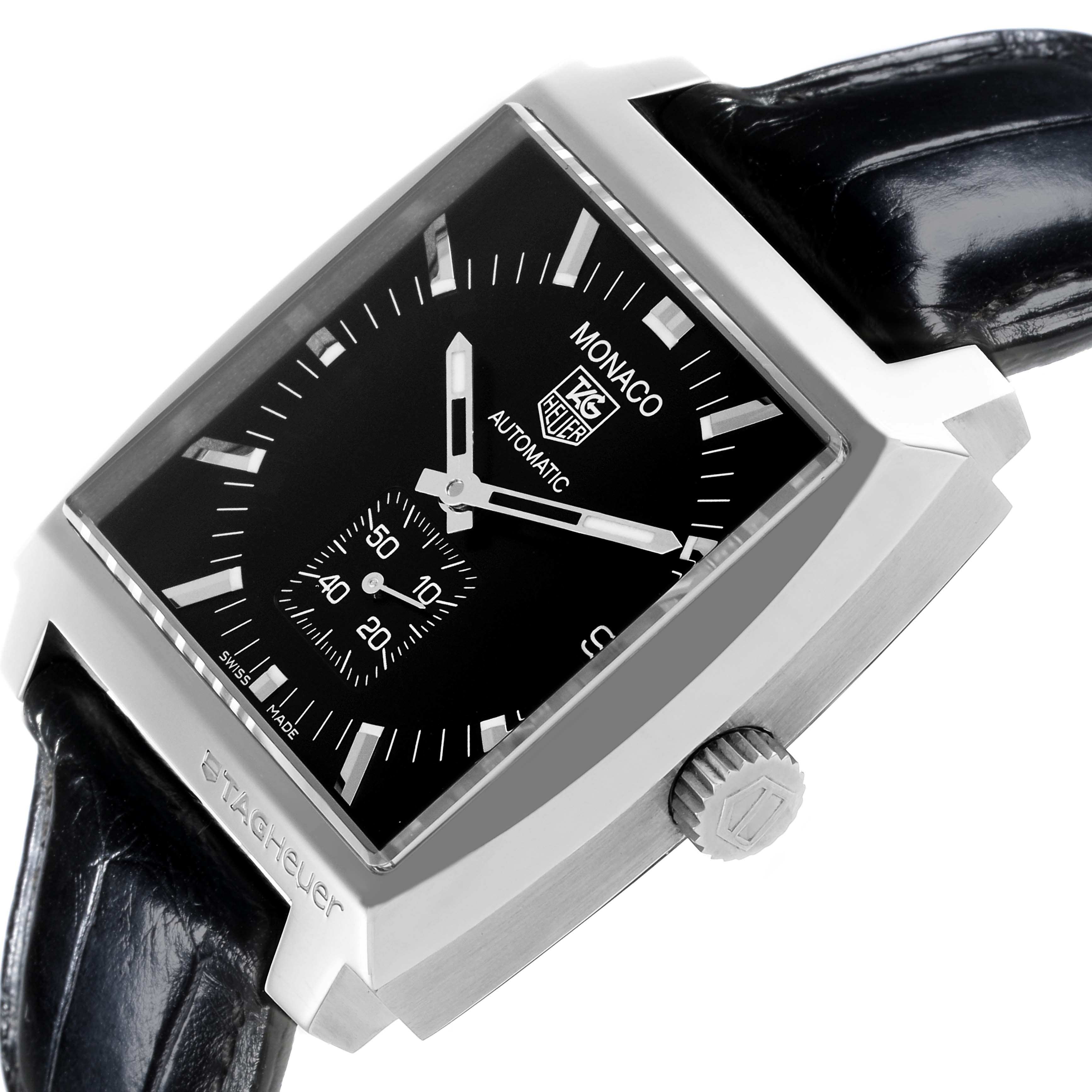 The Tag Heuer Monaco WW2110.FC6177 Men's Stainless Steel Black Dial WW2110.FC6177 Men's Stainless Steel Black Dial watch is shown at a tilted angle, highlighting its square face, leather strap, and side crown.