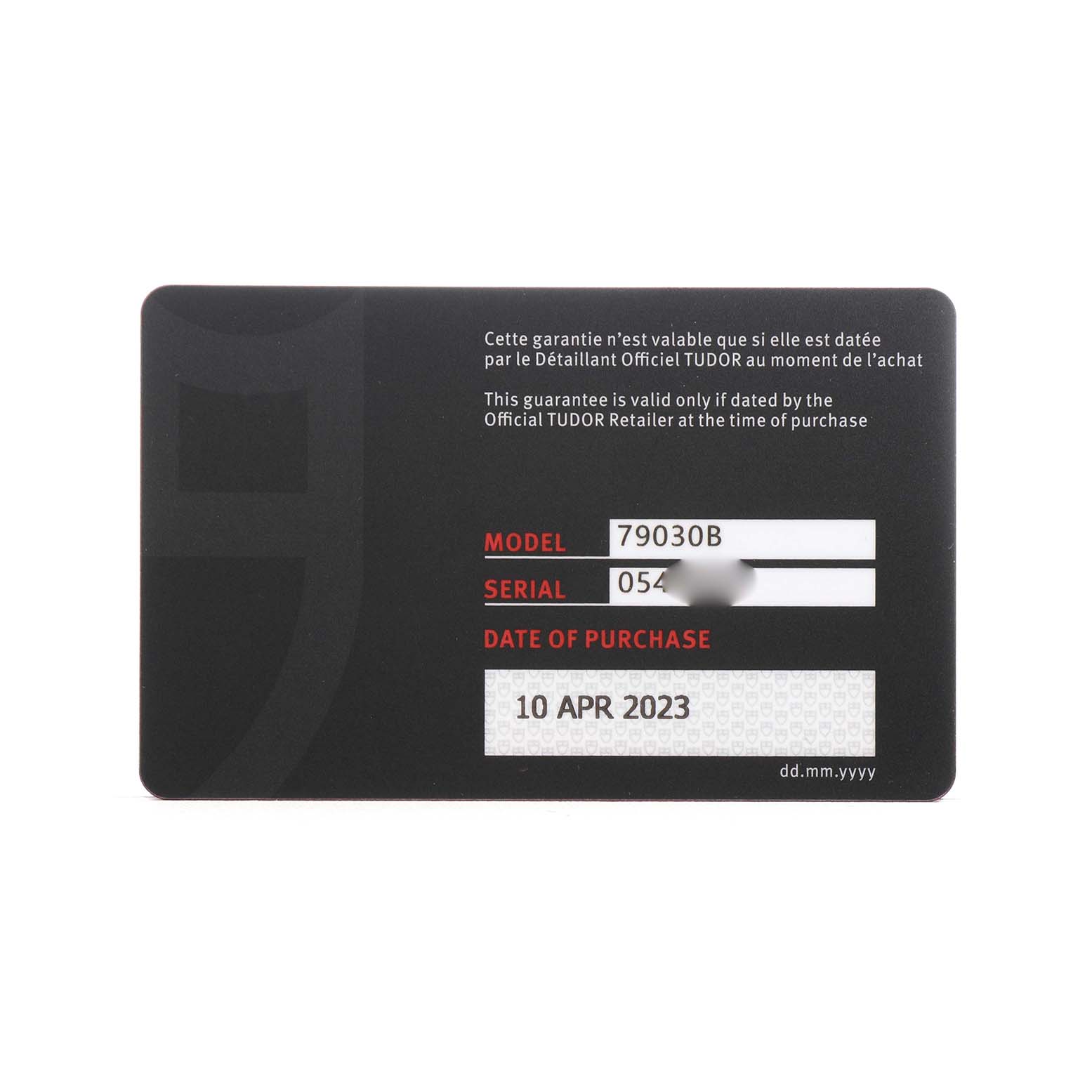 The image shows a warranty card for a Tudor Heritage Black Bay 79030 Men's Stainless Steel Blue Dial, model 79030B.