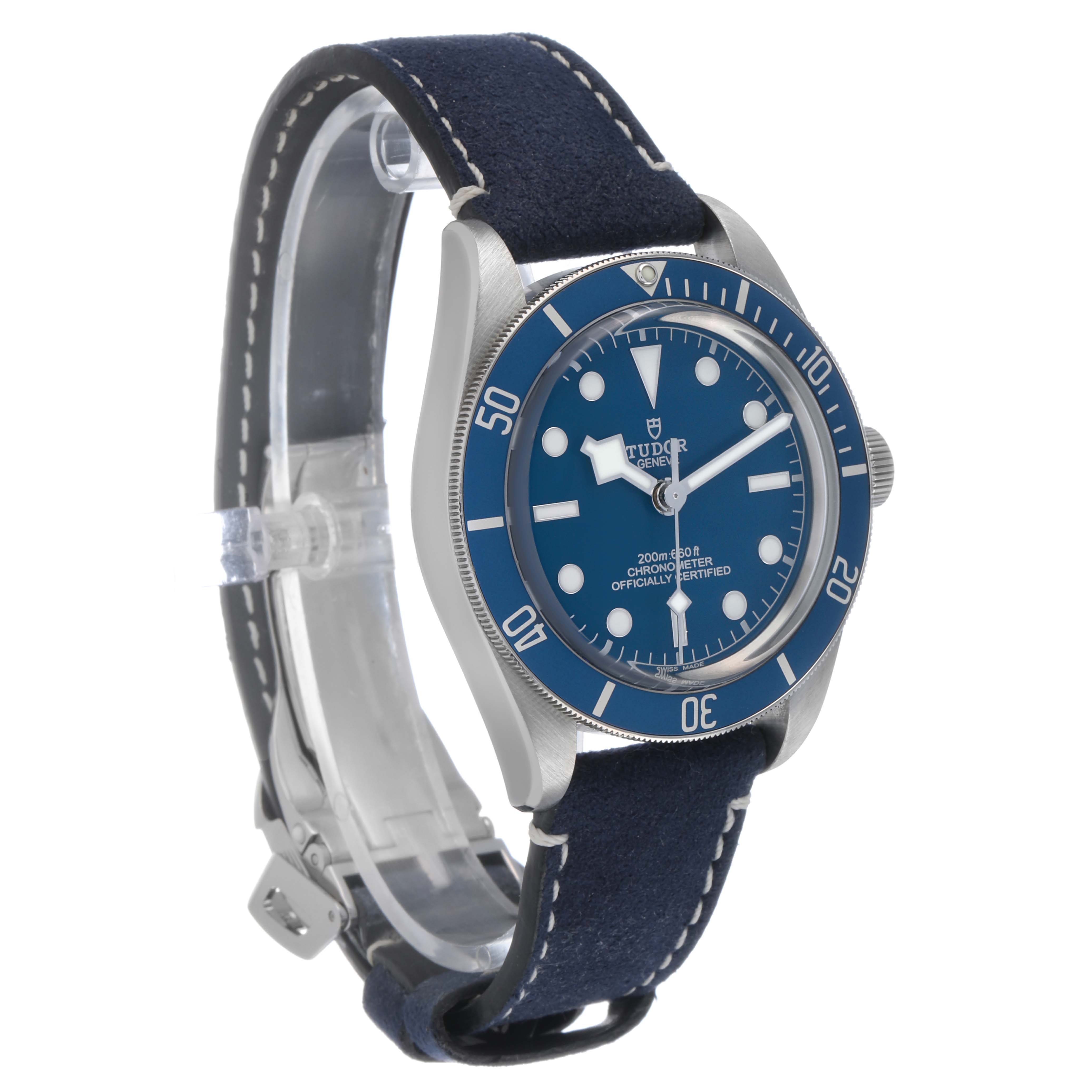 The Tudor Heritage Black Bay 79030 Men's Stainless Steel Blue Dial watch is shown at a slight angle, displaying the dial, bezel, and strap clearly.