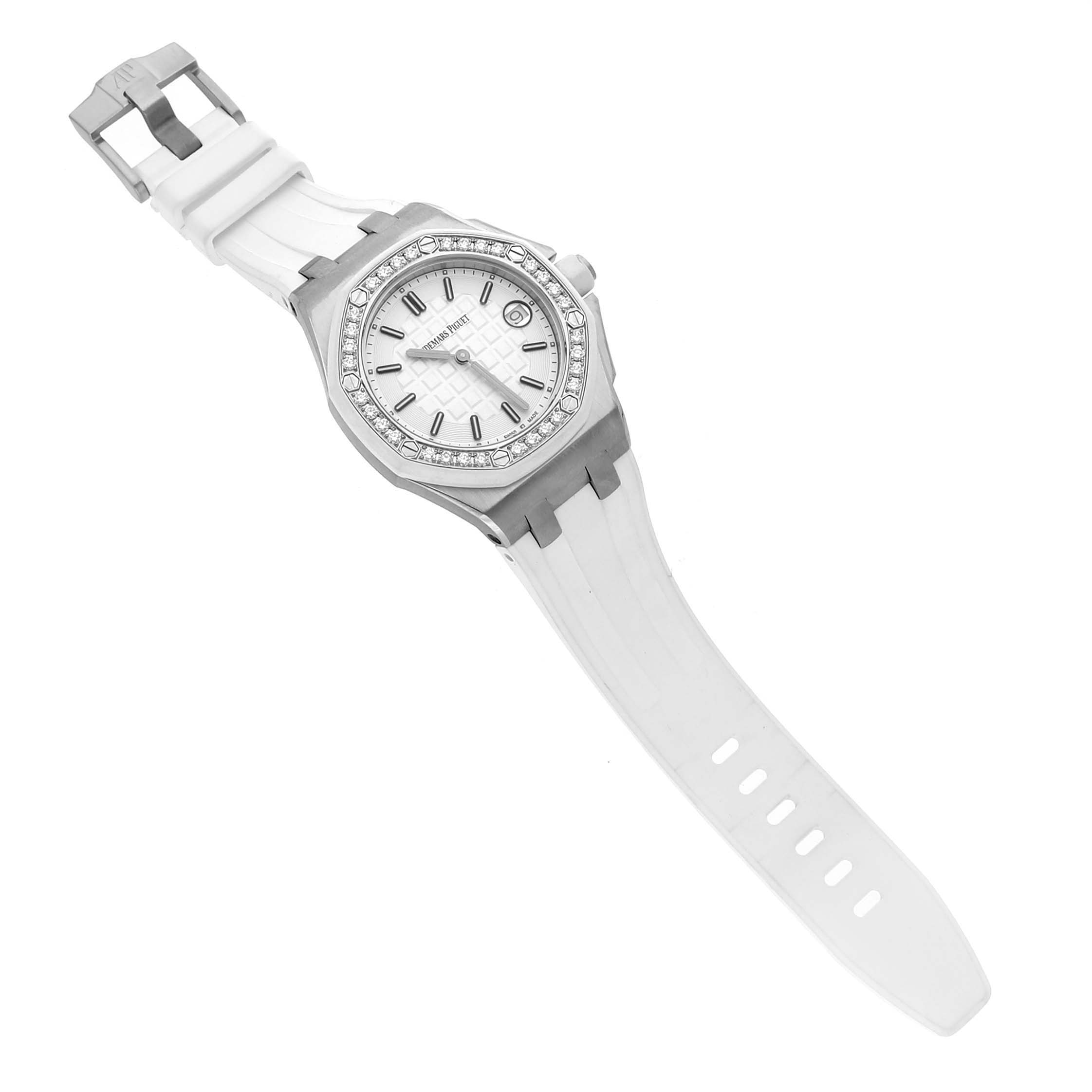 The Audemars Piguet Royal Oak Offshore 67540SK Women's Stainless Steel White Dial watch is shown at an angle displaying the face, bezel, and strap.