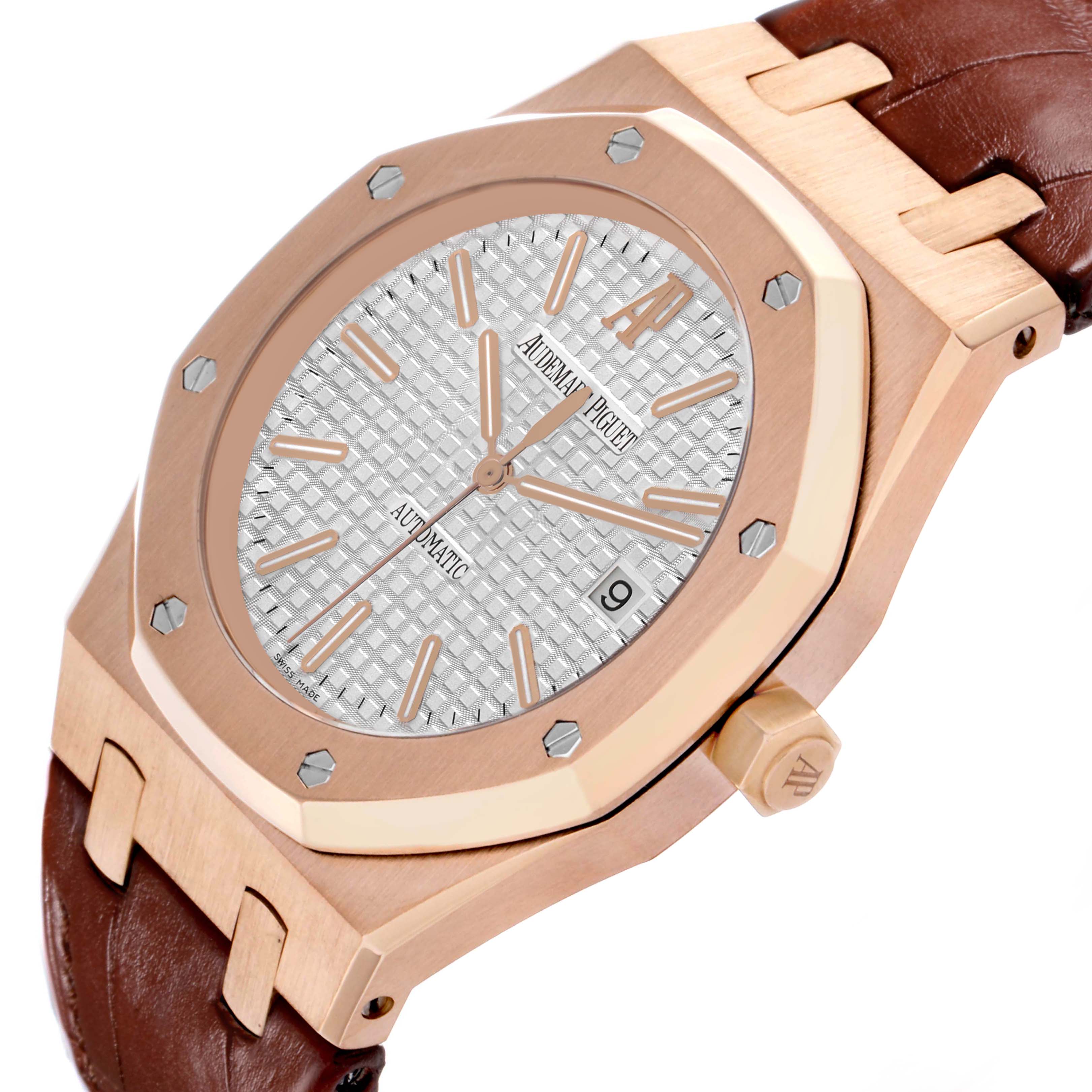 The Royal Oak by Audemars Piguet is shown at an angled side view, highlighting the octagonal bezel, dial, crown, and leather strap.