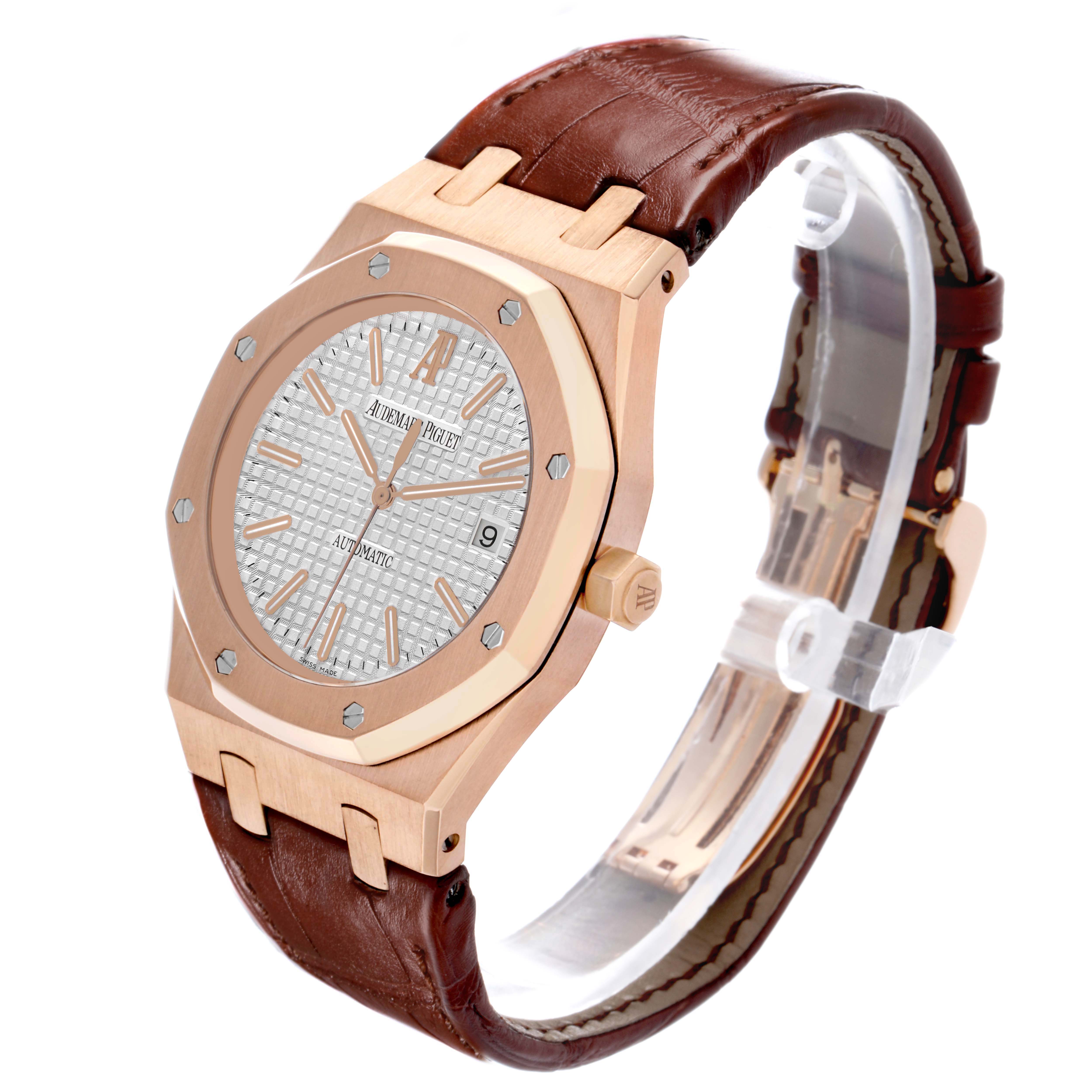 The Audemars Piguet Royal Oak 15400OR Men's Rose Gold Silver Dial watch is shown at a slight angle, displaying the face, bezel, crown, and leather strap.