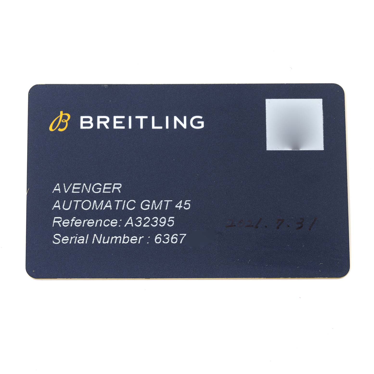 The image shows a close-up of a Breitling Avenger A32395 Men's Stainless Steel Blue Dial A32395 Men's Stainless Steel Blue Dial watch warranty card detailing the model, reference, and serial number.