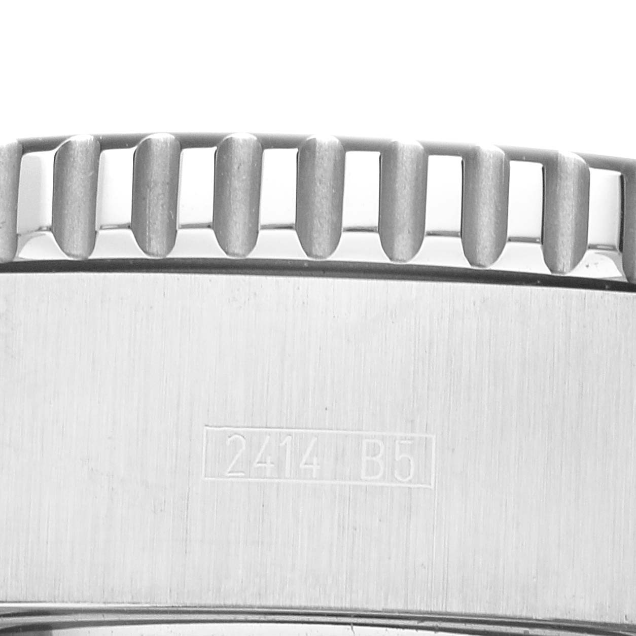 The image shows a close-up of the side view of the bezel and part of the case of a Breitling Superocean A13341C3/BD19 Men's Stainless Steel Black Dial A13341C3/BD19 Men's Stainless Steel Black Dial watch, highlighting its detailed engravings.