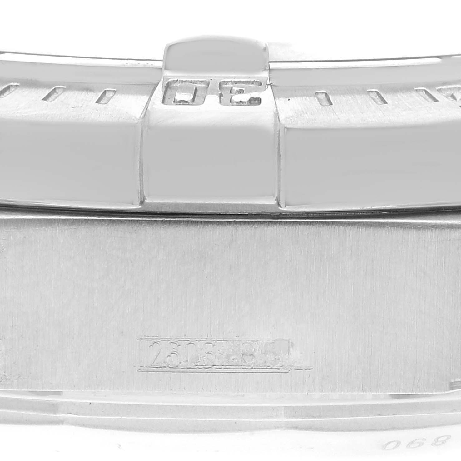 The image shows a close-up of the metal bezel and part of the casing of the Breitling Superocean A17390 Men's Stainless Steel Silver Dial A17390 Men's Stainless Steel Silver Dial watch.