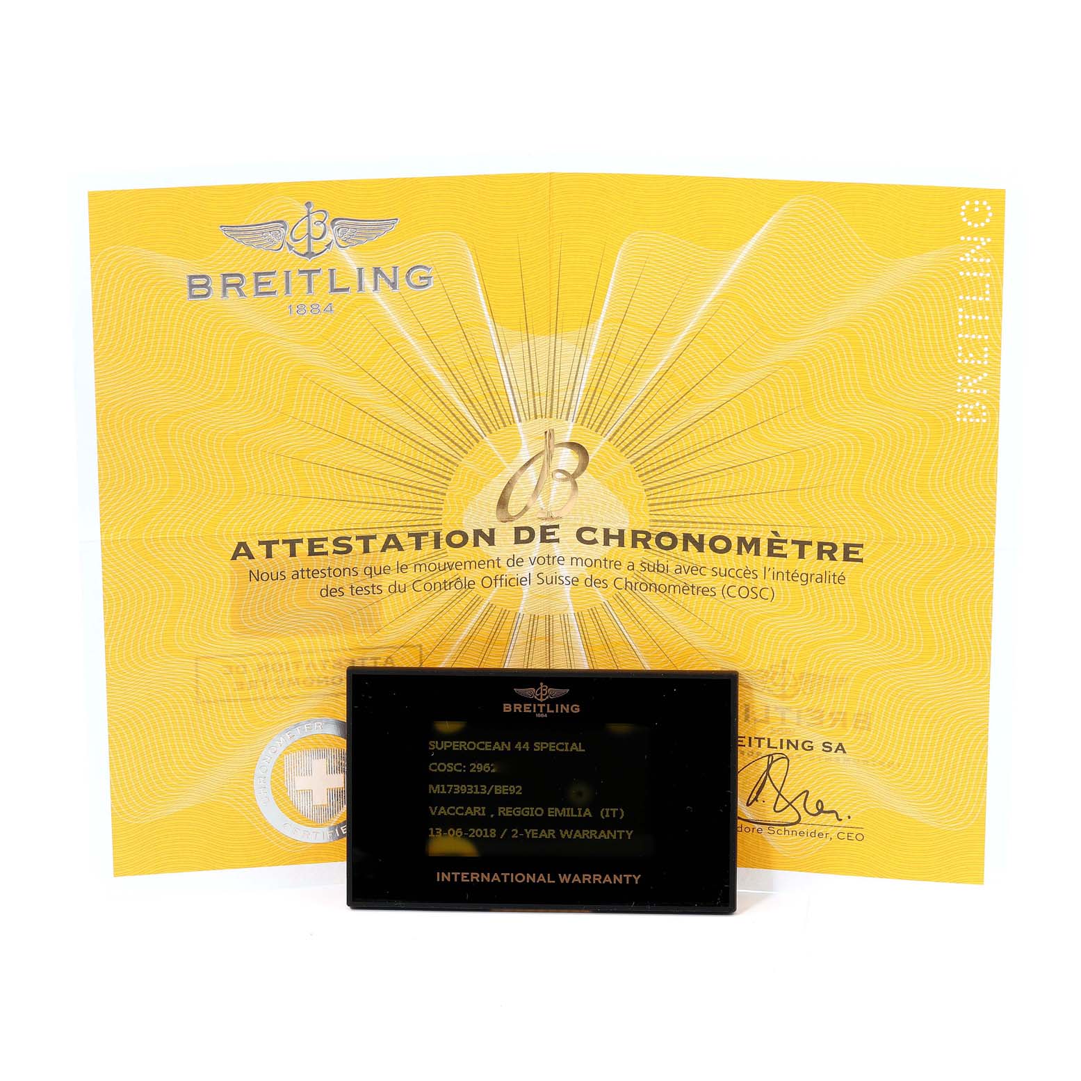 The image shows the warranty card and chronometer certificate for a Breitling Superocean M17393 Men's Stainless Steel Black Dial M17393 Men's Stainless Steel Black Dial watch.
