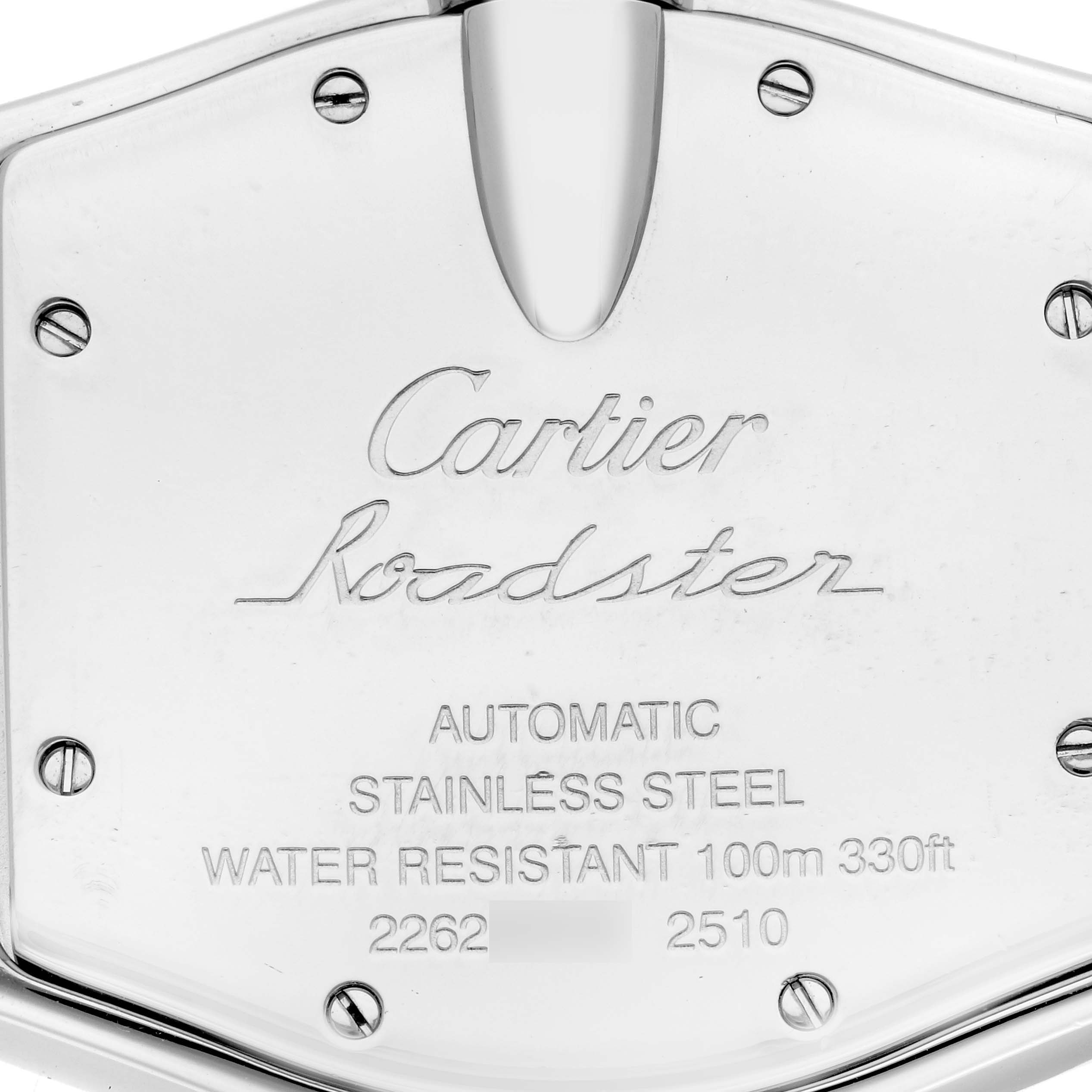 The image shows the back case of a Cartier Roadster W62025V3 Men's Stainless Steel Silver Dial W62025V3 Men's Stainless Steel Silver Dial watch, highlighting its engraved details and screws.