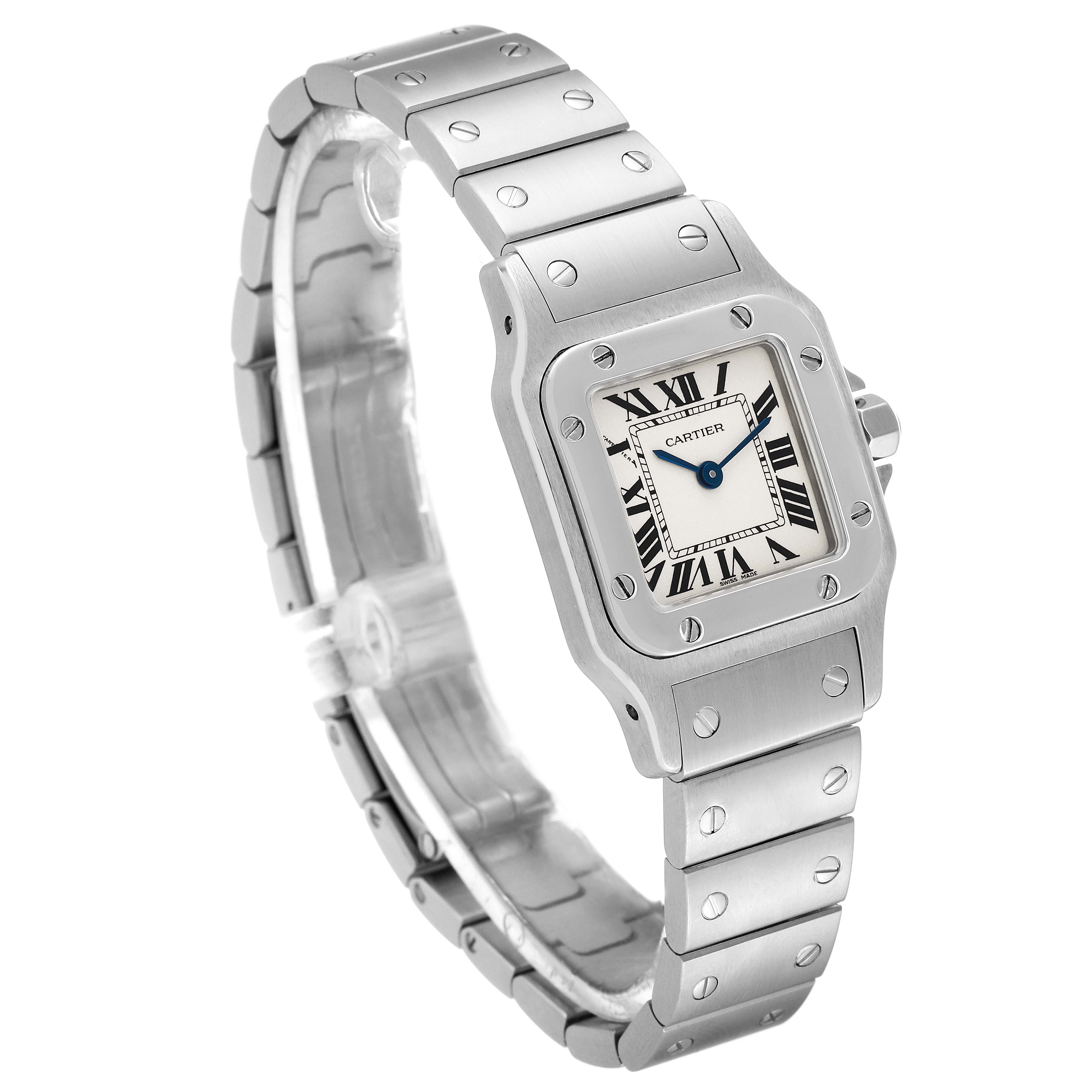 The Cartier Santos W20056D6 Women's Stainless Steel Silver Dial W20056D6 Women's Stainless Steel Silver Dial watch is shown at a rotated angle displaying the face, bezel, and part of the metal bracelet.
