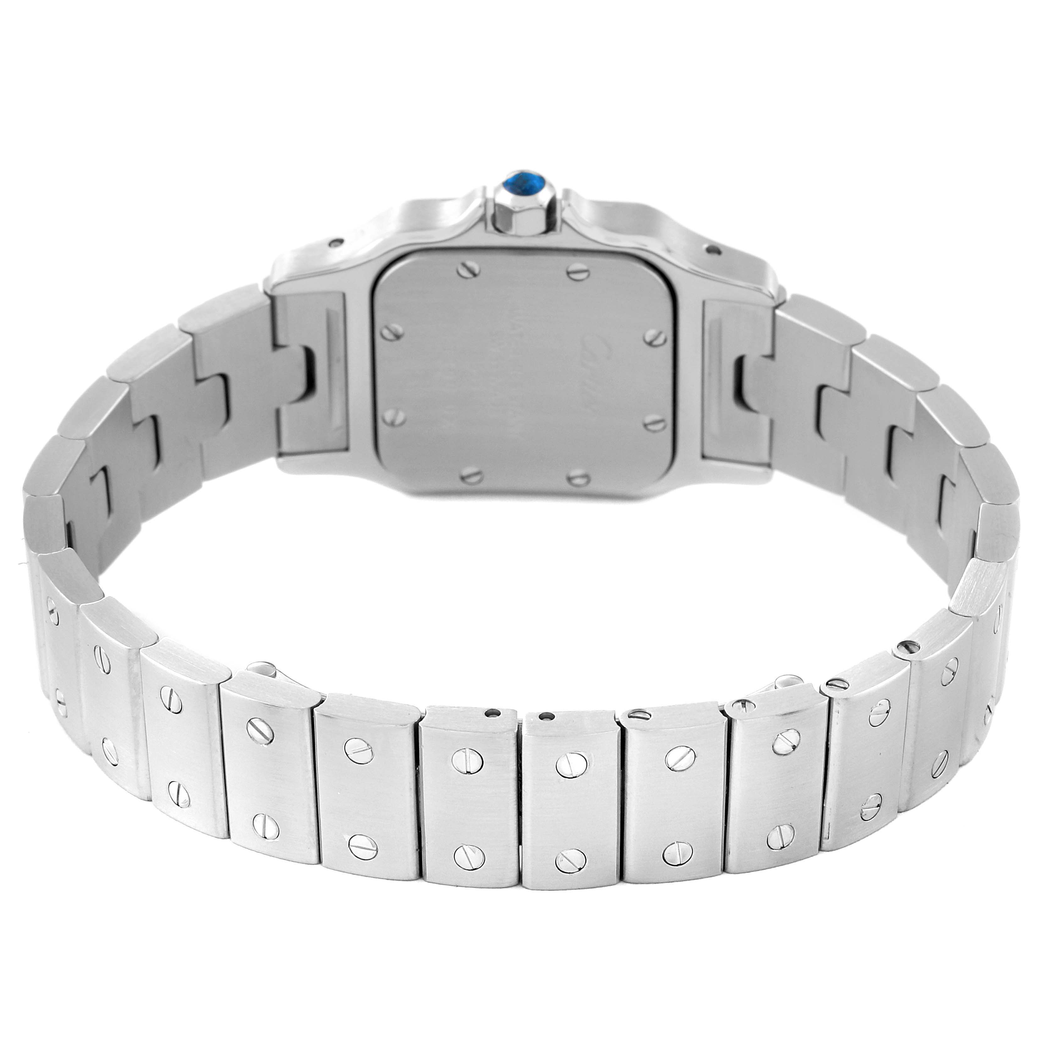 The image shows the back and bracelet of a Santos model watch by Cartier, viewed from an angle emphasizing the case back and links.