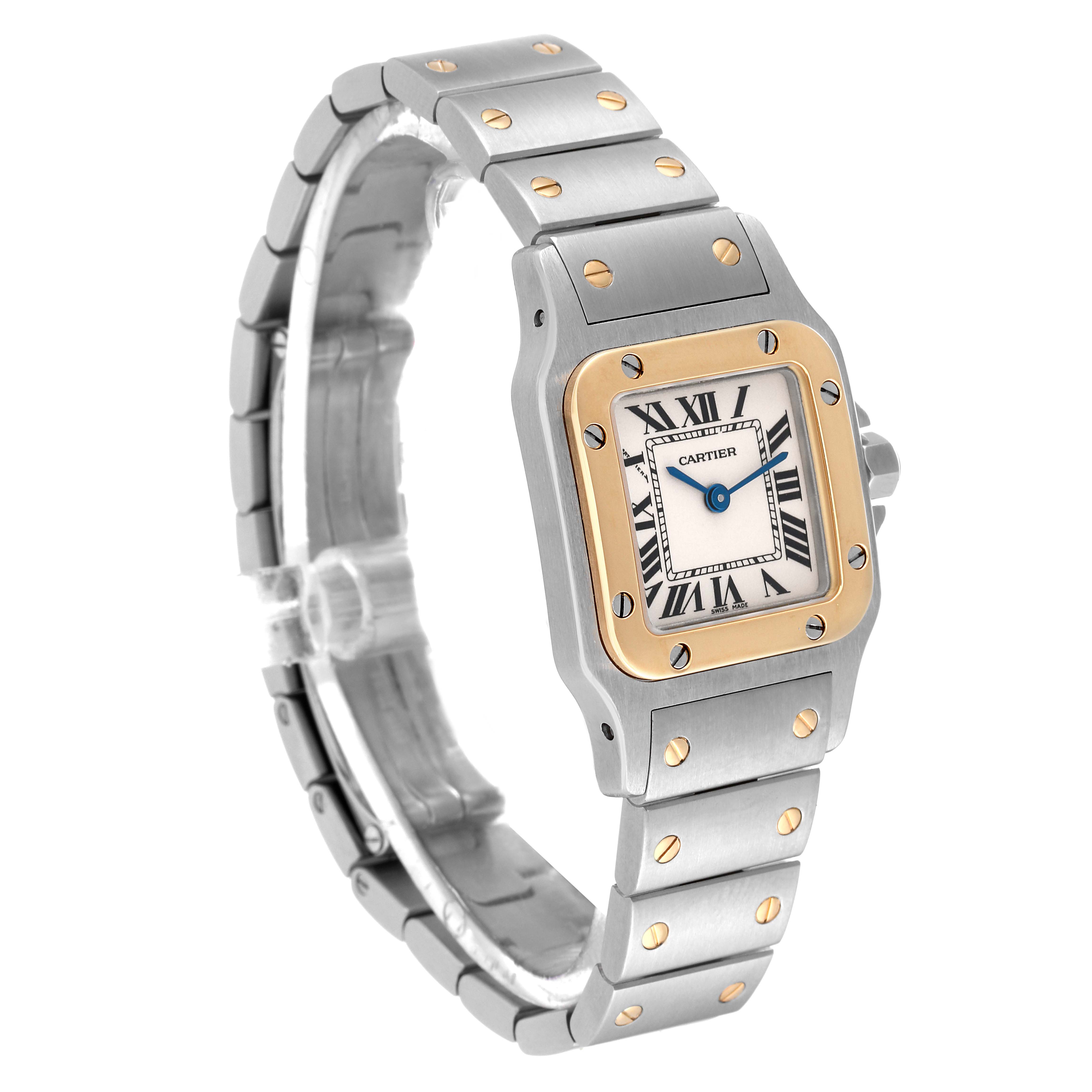 The image shows a Cartier Santos W20012C4 Women's Steel and Gold (two tone) Silver Dial W20012C4 Women's Steel and Gold (two tone) Silver Dial watch from a diagonal angle, highlighting its face and bracelet with gold accents.