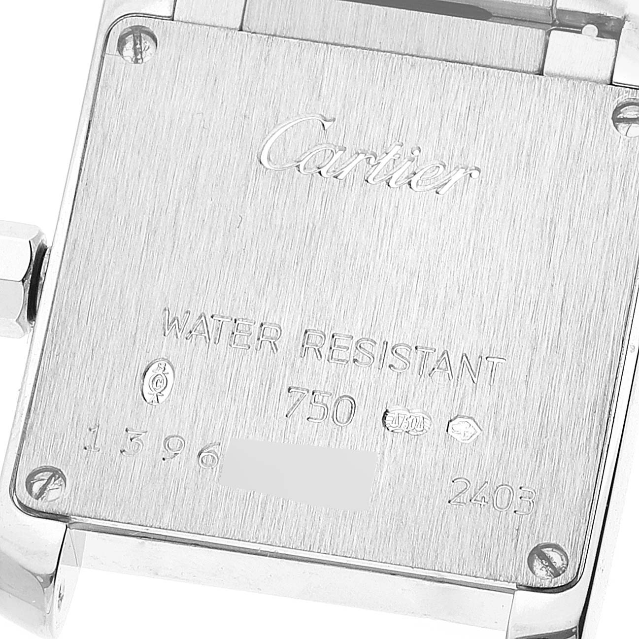 The image shows the back case of a Cartier Tank Francaise WE1002S3 Women's White Gold Silver Dial WE1002S3 Women's White Gold Silver Dial watch, displaying its engravings and water resistance marking.