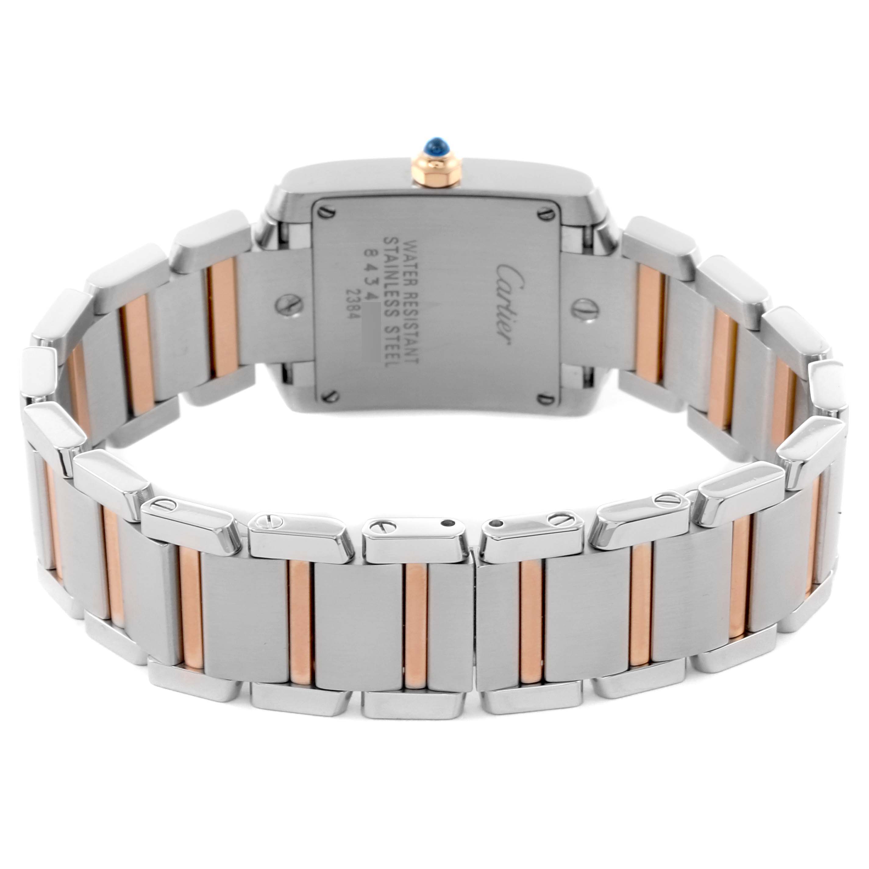 The Cartier Tank Francaise W51027Q4 Women's Steel and Gold (two tone) Mother of Pearl Dial W51027Q4 Women's Steel and Gold (two tone) Mother of Pearl Dial watch is shown from the back, highlighting the case back and two-tone bracelet.