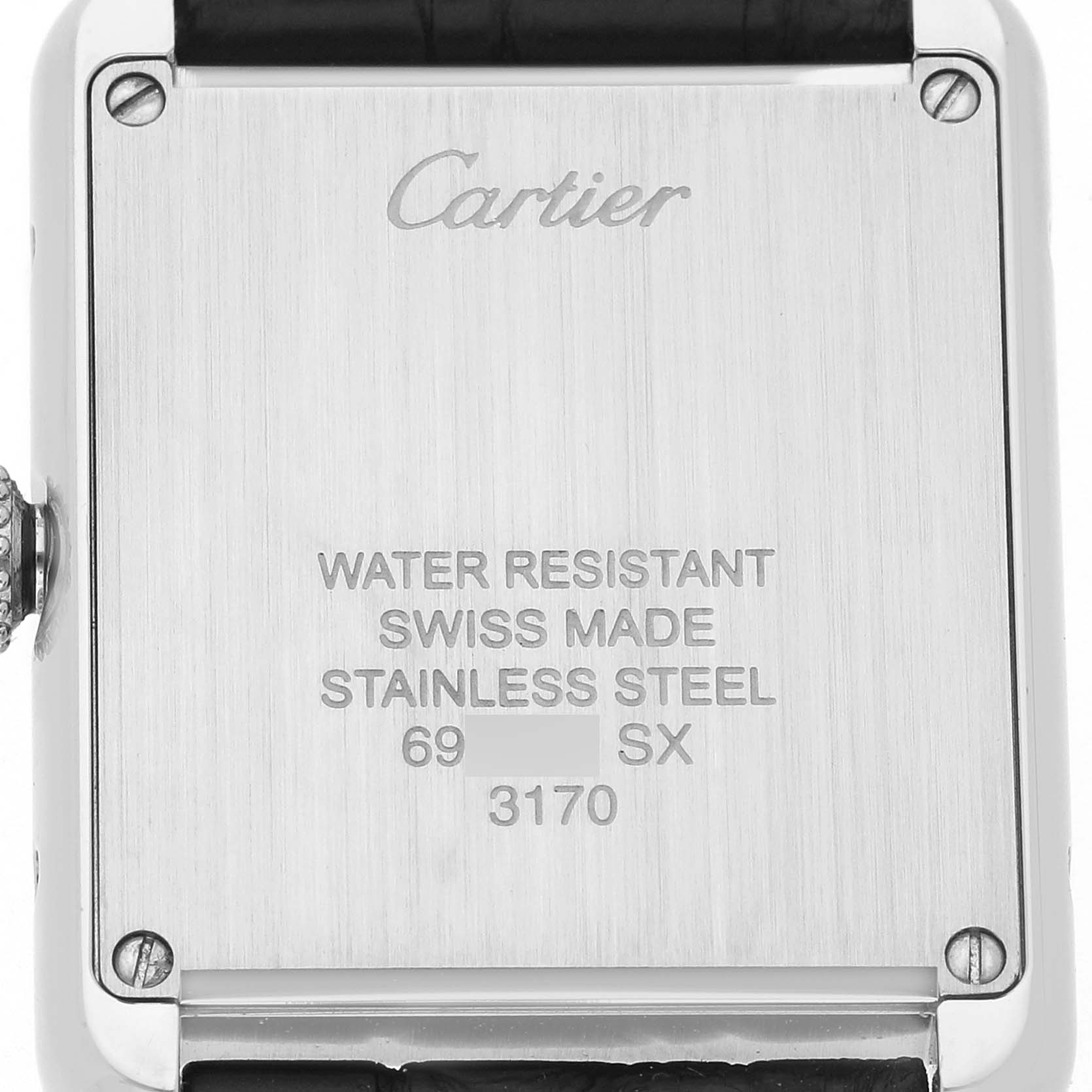 The image shows the back of the Cartier Tank Solo W5200005 Women's Stainless Steel Silver Dial watch, highlighting the engraving details.