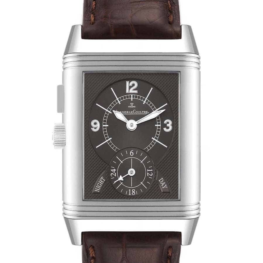 The image shows a frontal view of the Jaeger LeCoultre Reverso watch, highlighting its dial, crown, and leather strap.