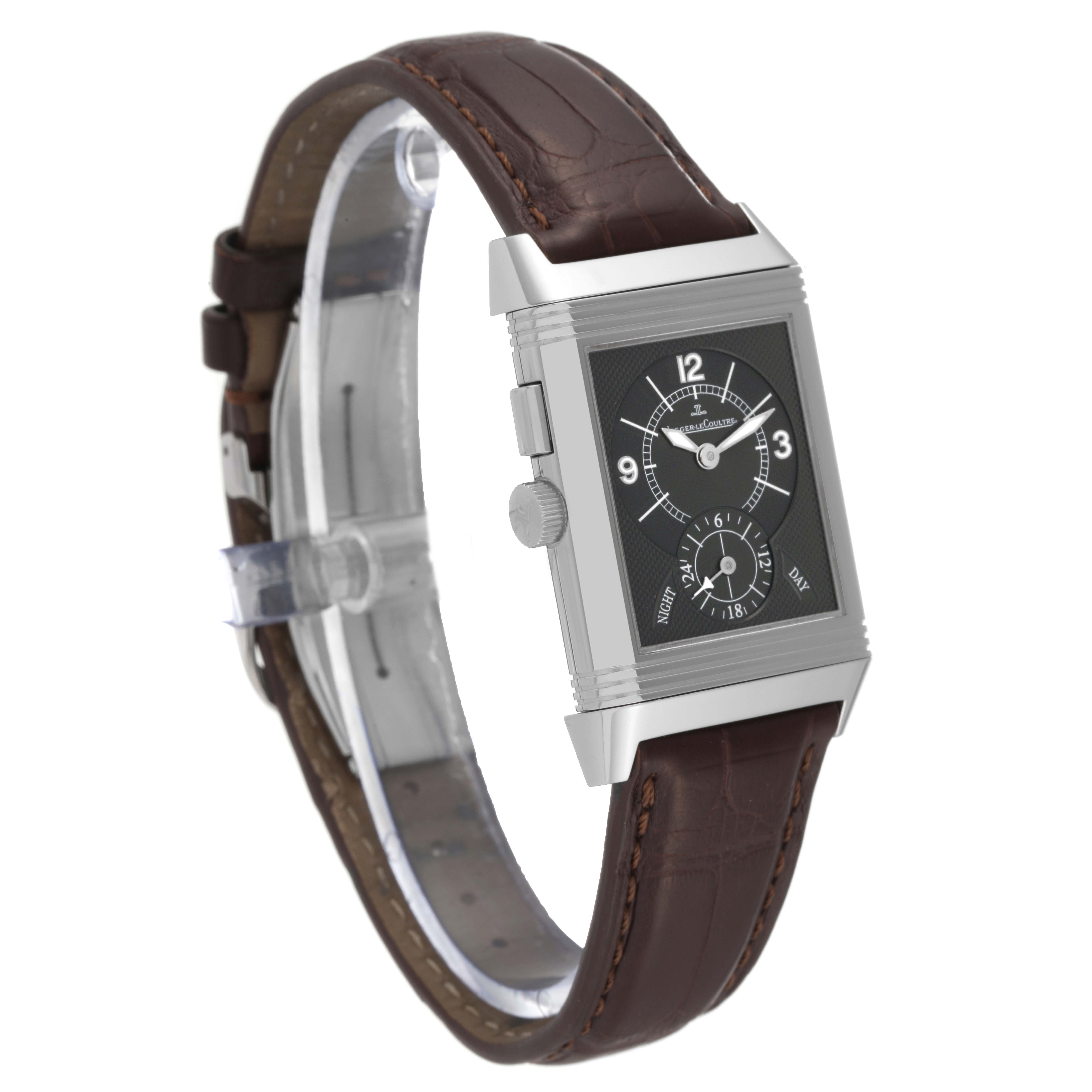 The Jaeger LeCoultre Reverso Q2718410 Men's Stainless Steel Silver Dial Q2718410 Men's Stainless Steel Silver Dial watch is shown from a slight side angle, highlighting its rectangular face, dial, and brown leather strap.