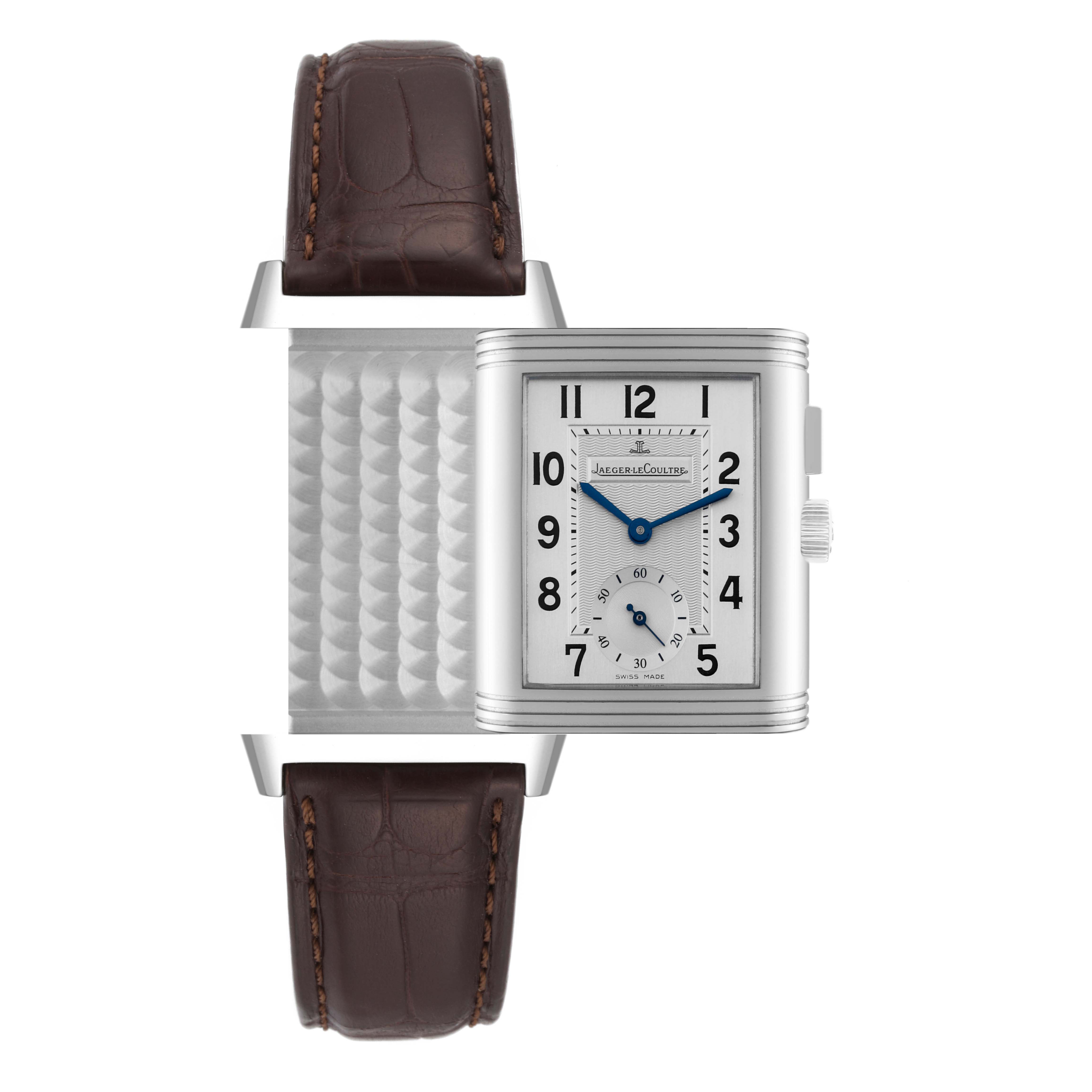 This image shows a Jaeger LeCoultre Reverso Q2718410 Men's Stainless Steel Silver Dial Q2718410 Men's Stainless Steel Silver Dial watch with a partially rotated case, brown leather strap, and visible dial.