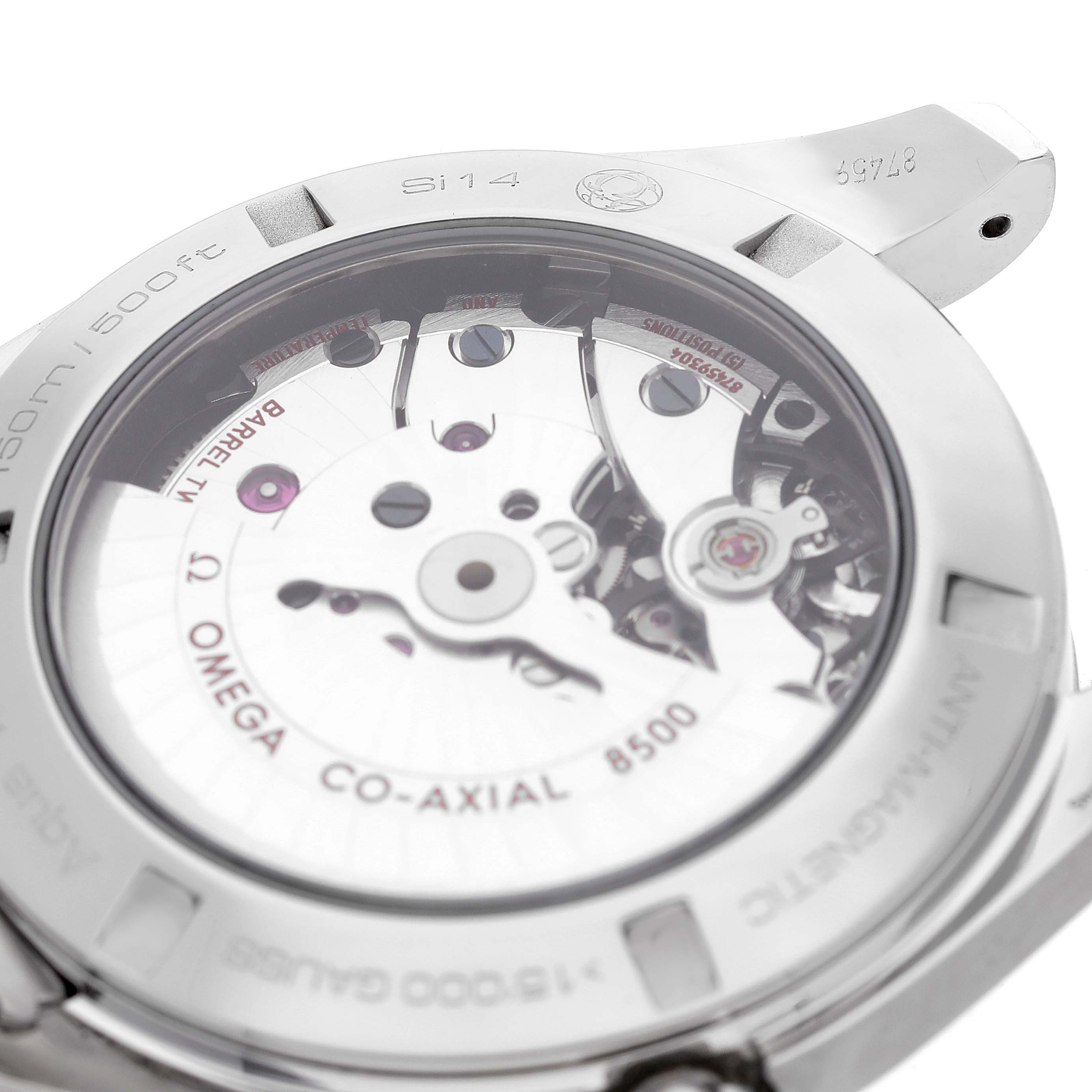 The image shows the back and internal movement of the Aqua Terra model by Omega, highlighting the Co-Axial 8500 automatic mechanism.