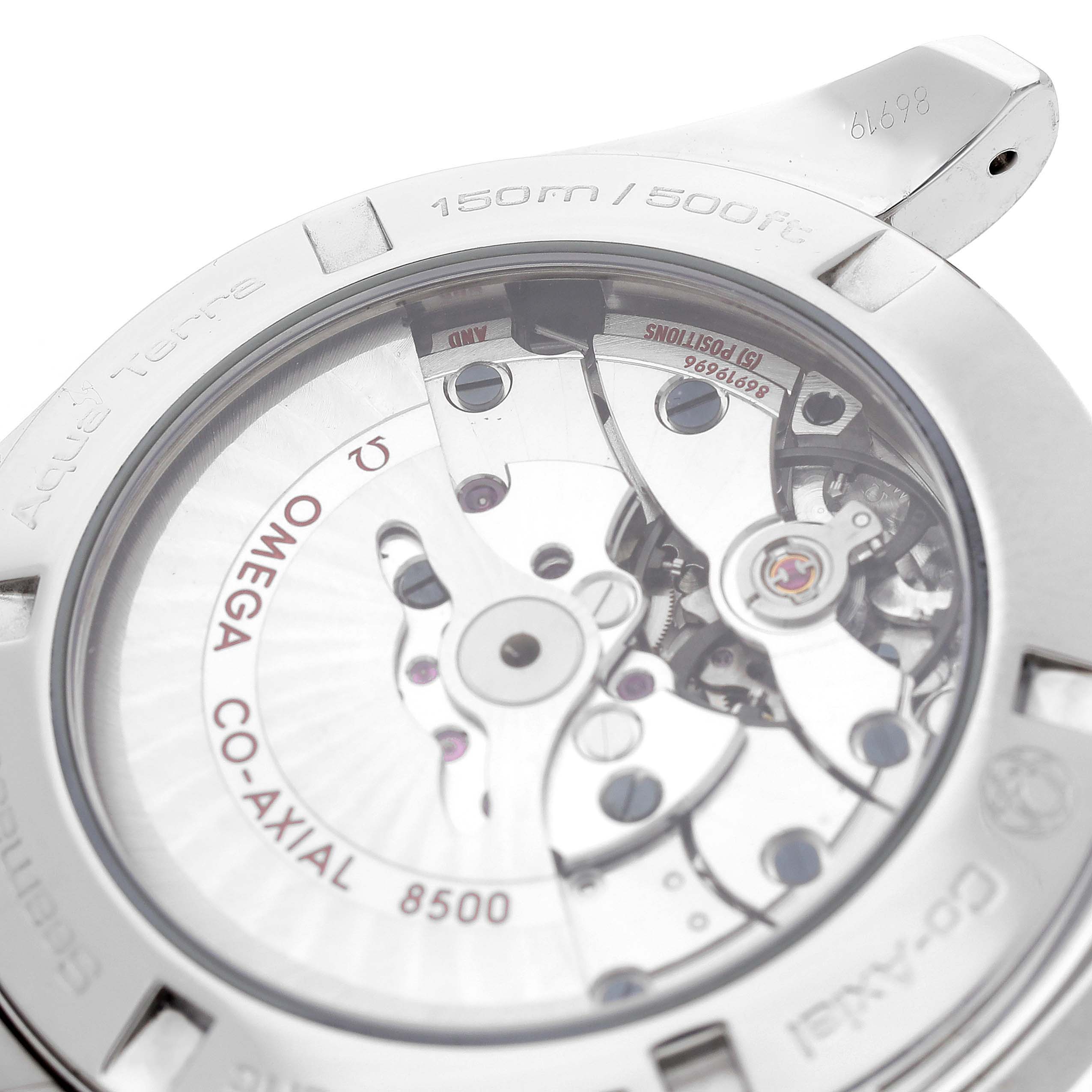 The image shows a close-up of the Omega Aqua Terra 231.10.42.21.03.001 Men
s Stainless Steel Blue Dial 231.10.42.21.03.001 Men
s Stainless Steel Blue Dial watch
s back, highlighting its Co-Axial 8500 movement.