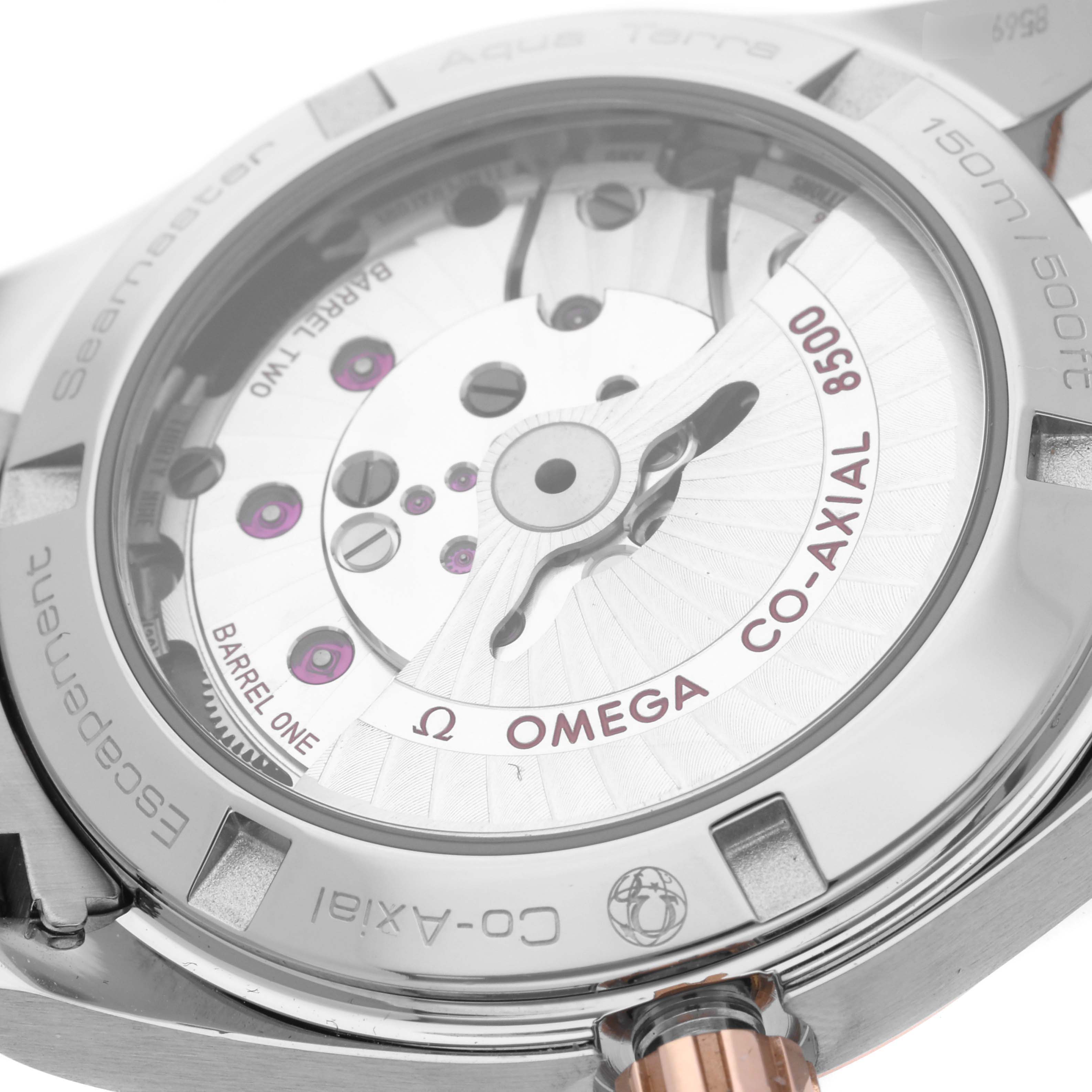 The image shows the back view of the Omega Aqua Terra 231.20.39.21.06.003 Men's Steel and Gold (two tone) Grey Dial 231.20.39.21.06.003 Men's Steel and Gold (two tone) Grey Dial watch, highlighting the Co-Axial 8500 movement.