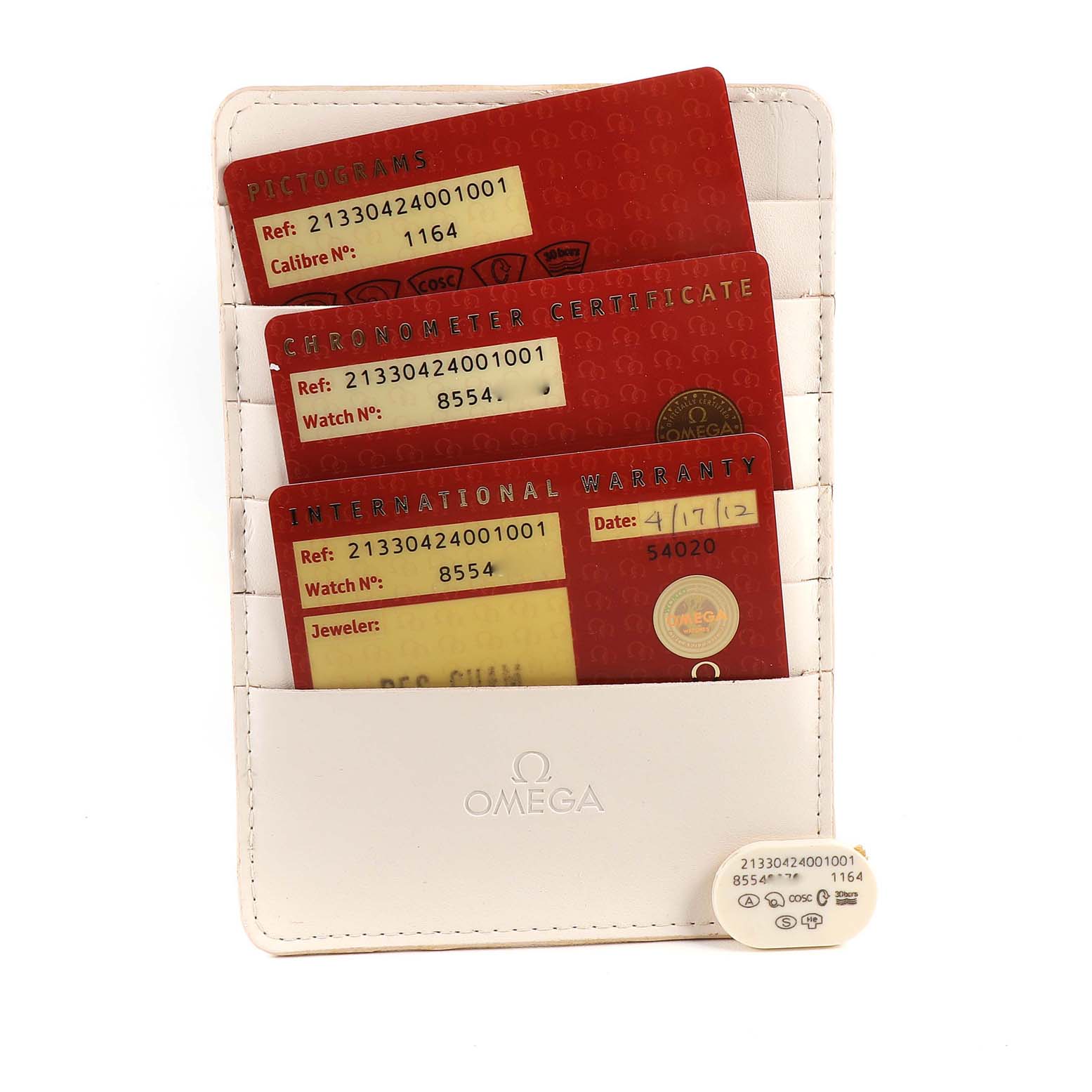 The image shows warranty and certification cards for an Omega Seamaster 213.30.42.40.01.001 Men's Stainless Steel Black Dial 213.30.42.40.01.001 Men's Stainless Steel Black Dial watch in a white Omega cardholder.