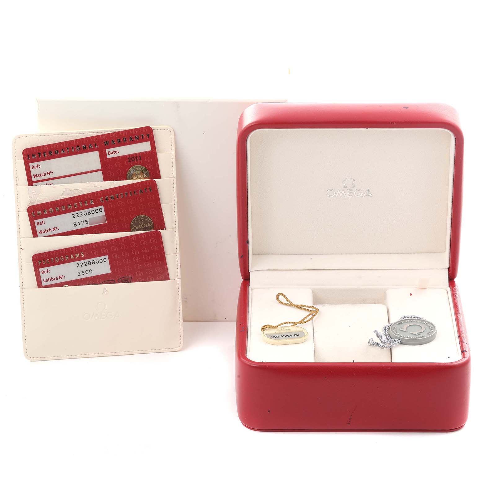 The image shows an Omega Seamaster 2220.80.00 Men
s Stainless Steel Blue Dial 2220.80.00 Men
s Stainless Steel Blue Dial watch box and documentation, including warranty cards and certificates.