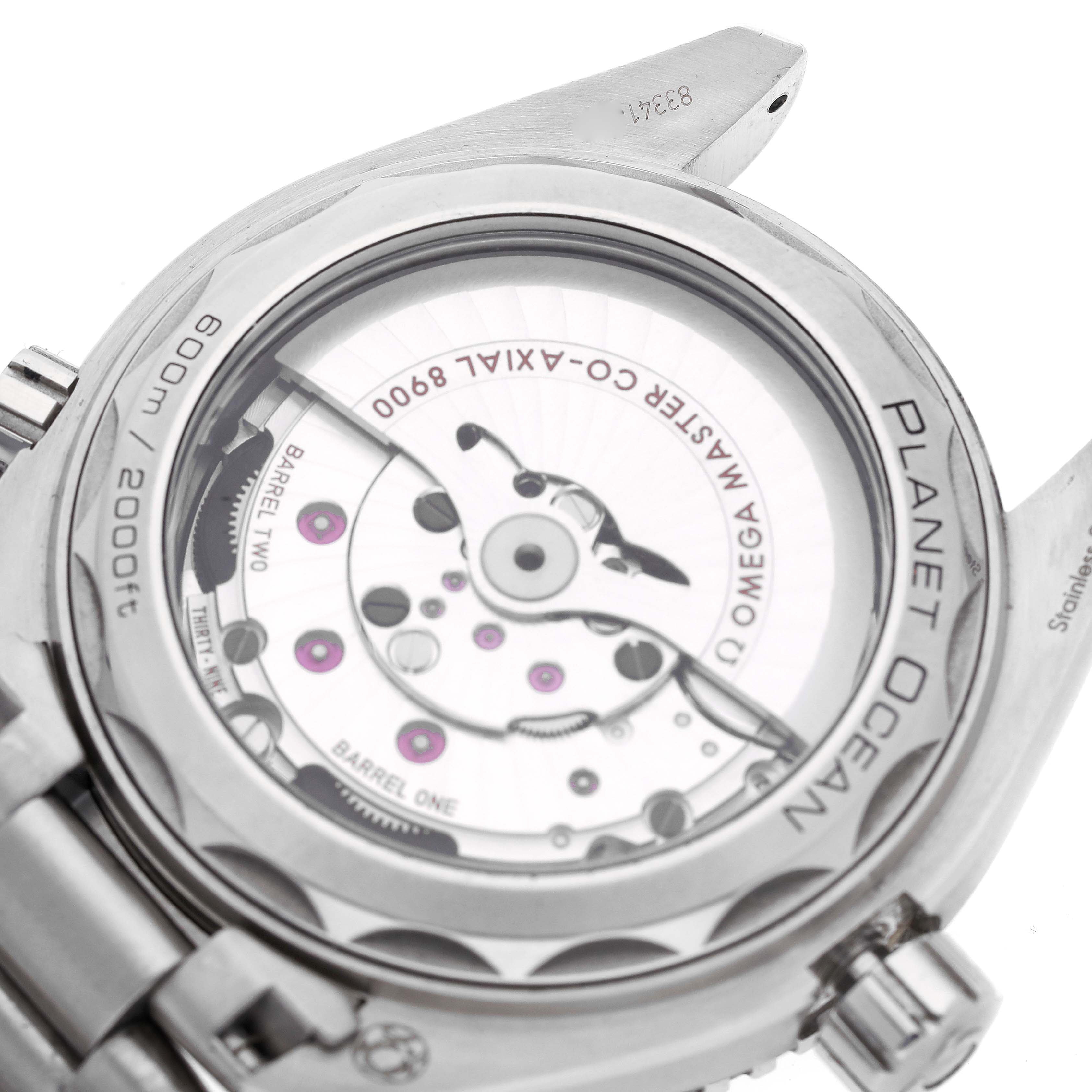 The image shows the back side of an Omega Planet Ocean 215.30.44.21.01.001 Men
s Stainless Steel Black Dial 215.30.44.21.01.001 Men
s Stainless Steel Black Dial watch, highlighting the movement and inner mechanisms.