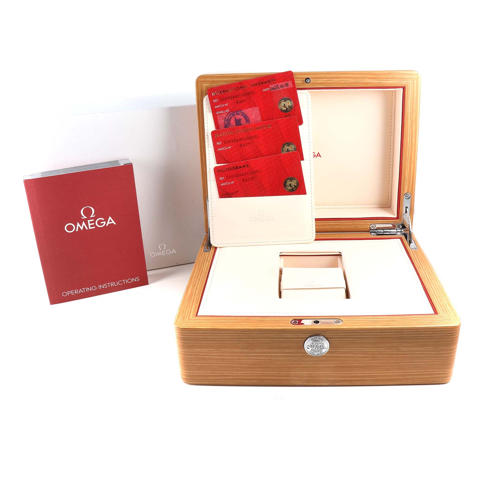 The image shows the box for an Omega Planet Ocean 215.30.44.21.01.001 Men
s Stainless Steel Black Dial 215.30.44.21.01.001 Men
s Stainless Steel Black Dial model, complete with a warranty cardholder, red operating instructions, and a wooden storage case.