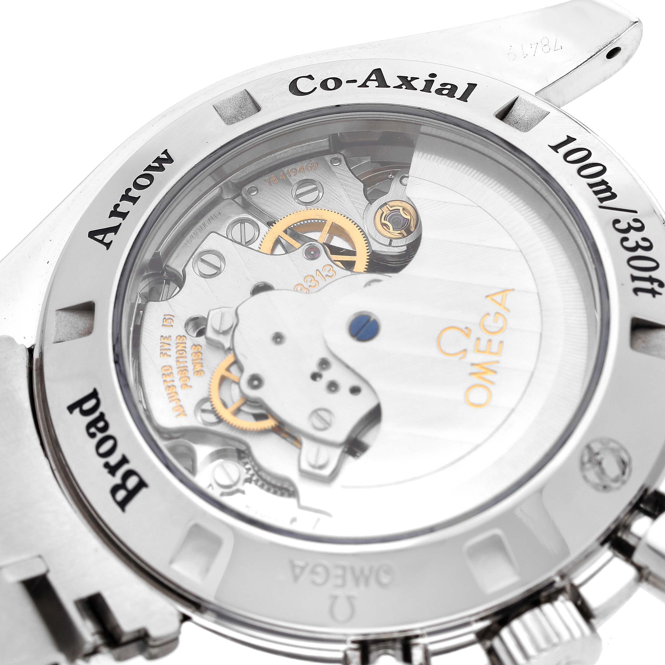 The image shows the back view of the Omega Speedmaster 321.10.42.50.01.001 Men's Stainless Steel Black Dial 321.10.42.50.01.001 Men's Stainless Steel Black Dial watch, highlighting its Co-Axial movement and internal mechanisms.