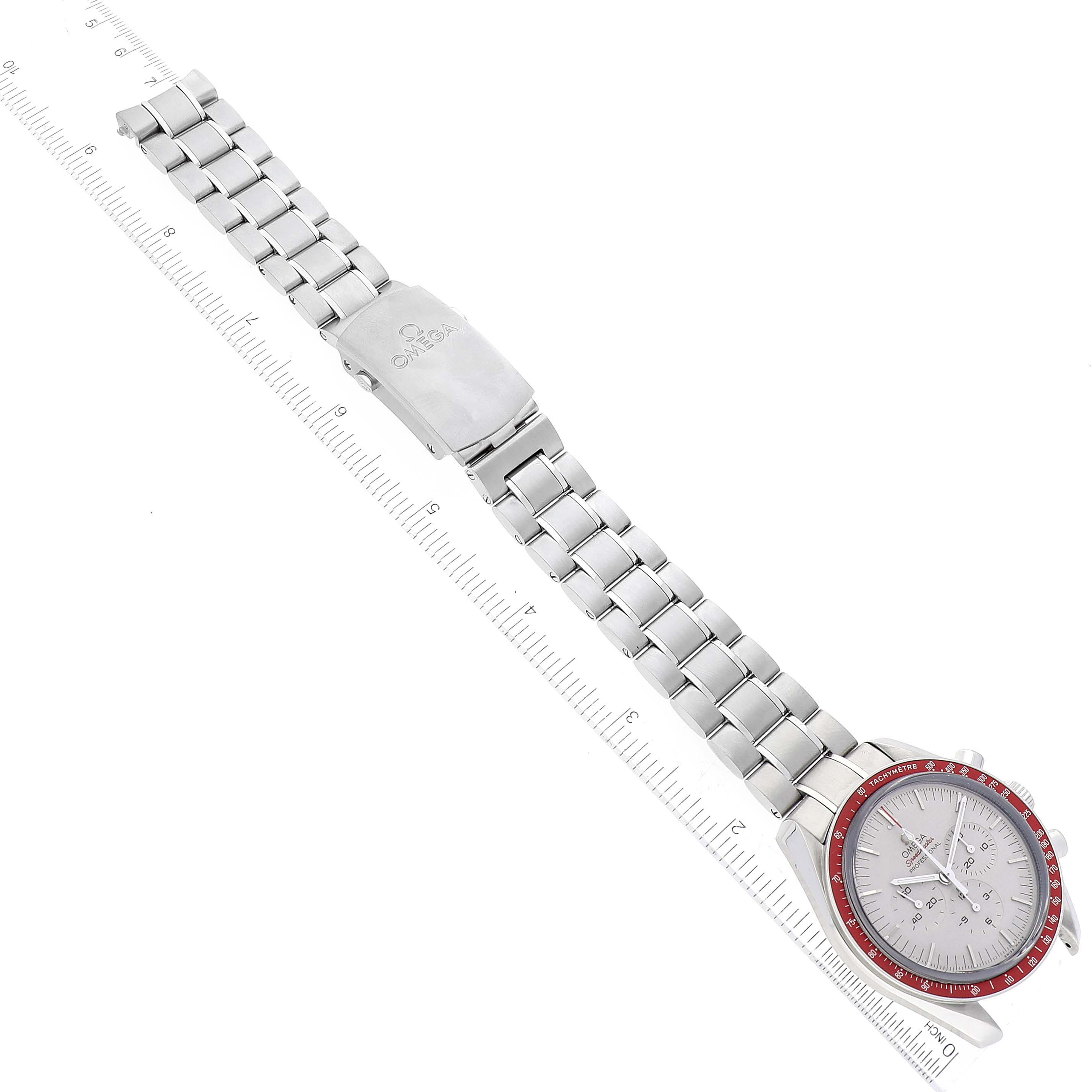 This image shows the Omega Speedmaster 522.30.42.30.06.001 Men's Stainless Steel Silver Dial 522.30.42.30.06.001 Men's Stainless Steel Silver Dial watch from a top-down angle, displaying its face, red bezel, and metal bracelet.