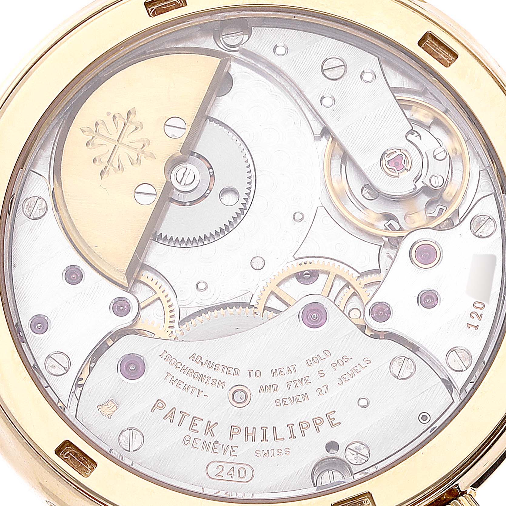 This is a close-up view of the back side, showcasing the movement mechanism of a Patek Philippe Calatrava 5120J Men's Yellow Gold White Dial 5120J Men's Yellow Gold White Dial watch.