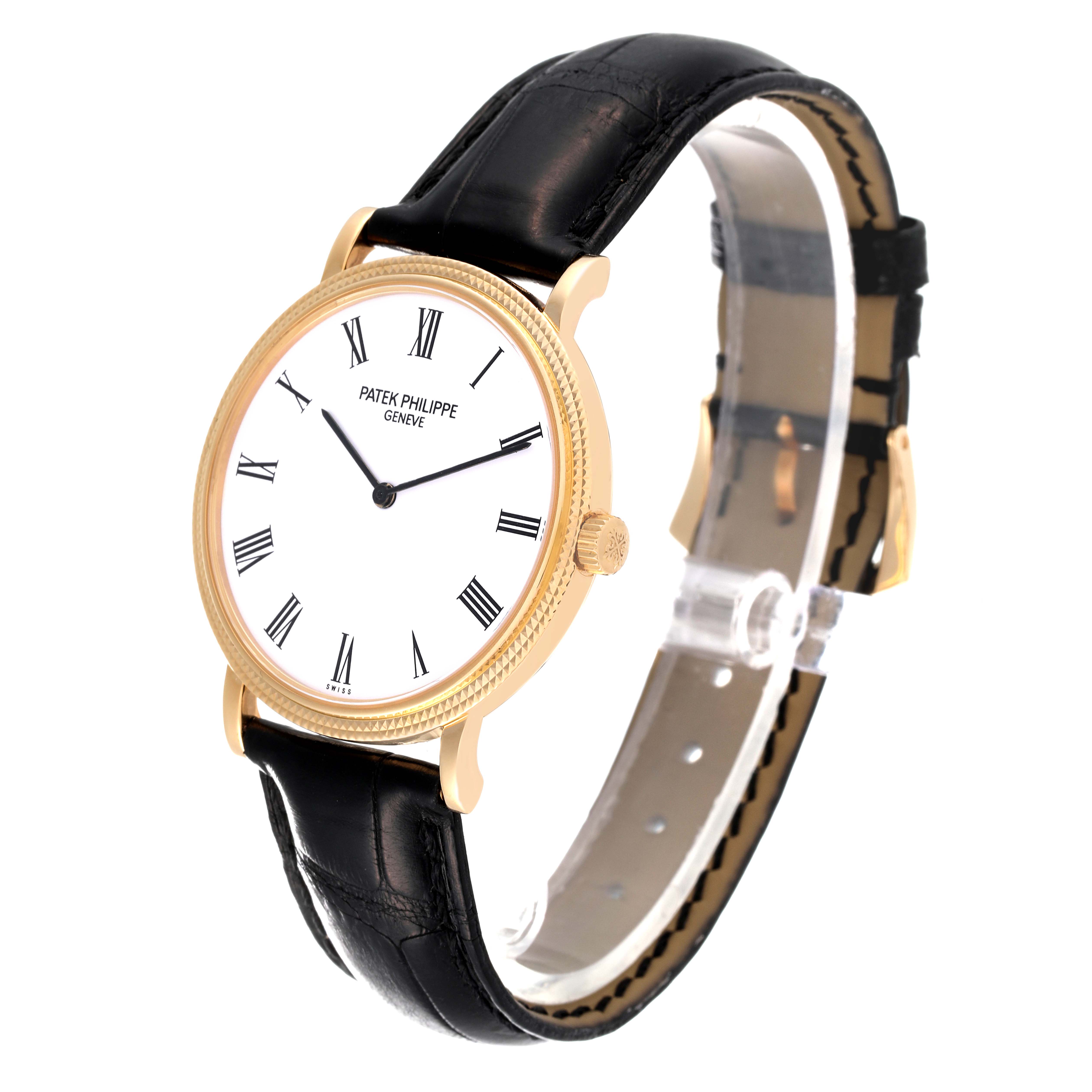 This image shows a Patek Philippe Calatrava 5120J Men's Yellow Gold White Dial 5120J Men's Yellow Gold White Dial model watch at a front angle, highlighting its white dial, black leather strap, and gold case.