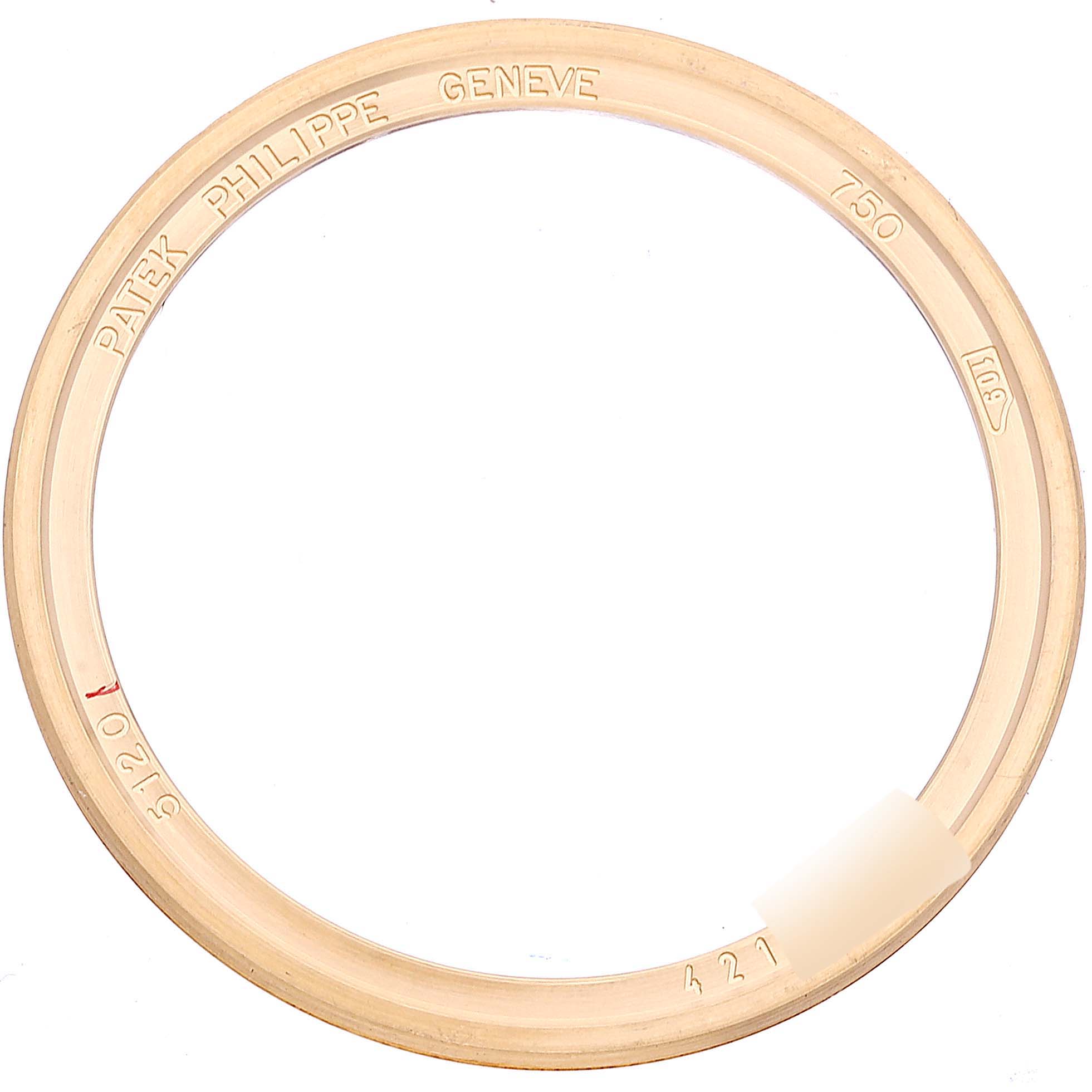 This image shows the bezel of a Patek Philippe Calatrava 5120J Men's Yellow Gold White Dial 5120J Men's Yellow Gold White Dial watch, viewed from above.