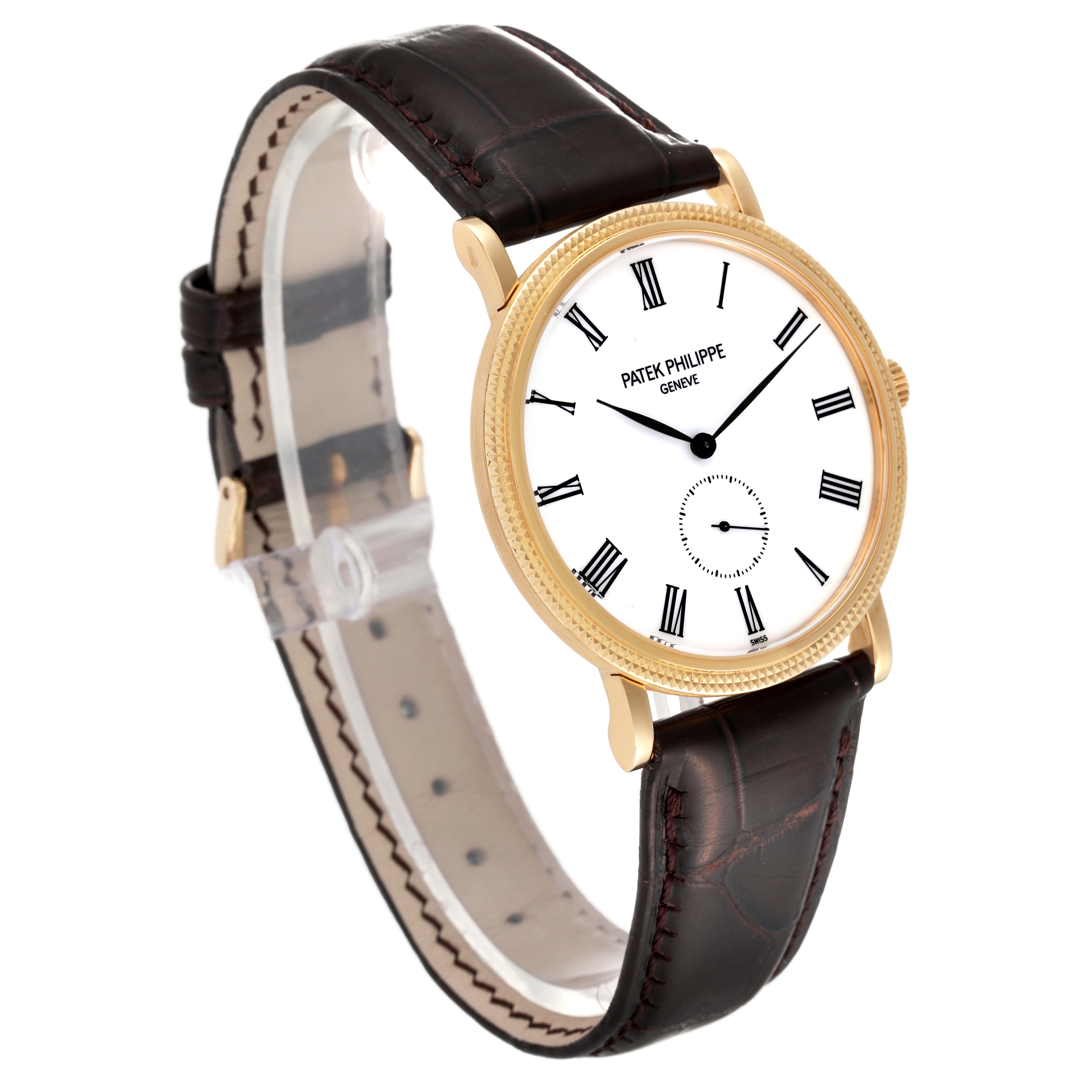 This image shows a Patek Philippe Calatrava 5119J Men
s Yellow Gold White Dial 5119J Men
s Yellow Gold White Dial watch, angled to display the face, bezel, lugs, and leather strap.