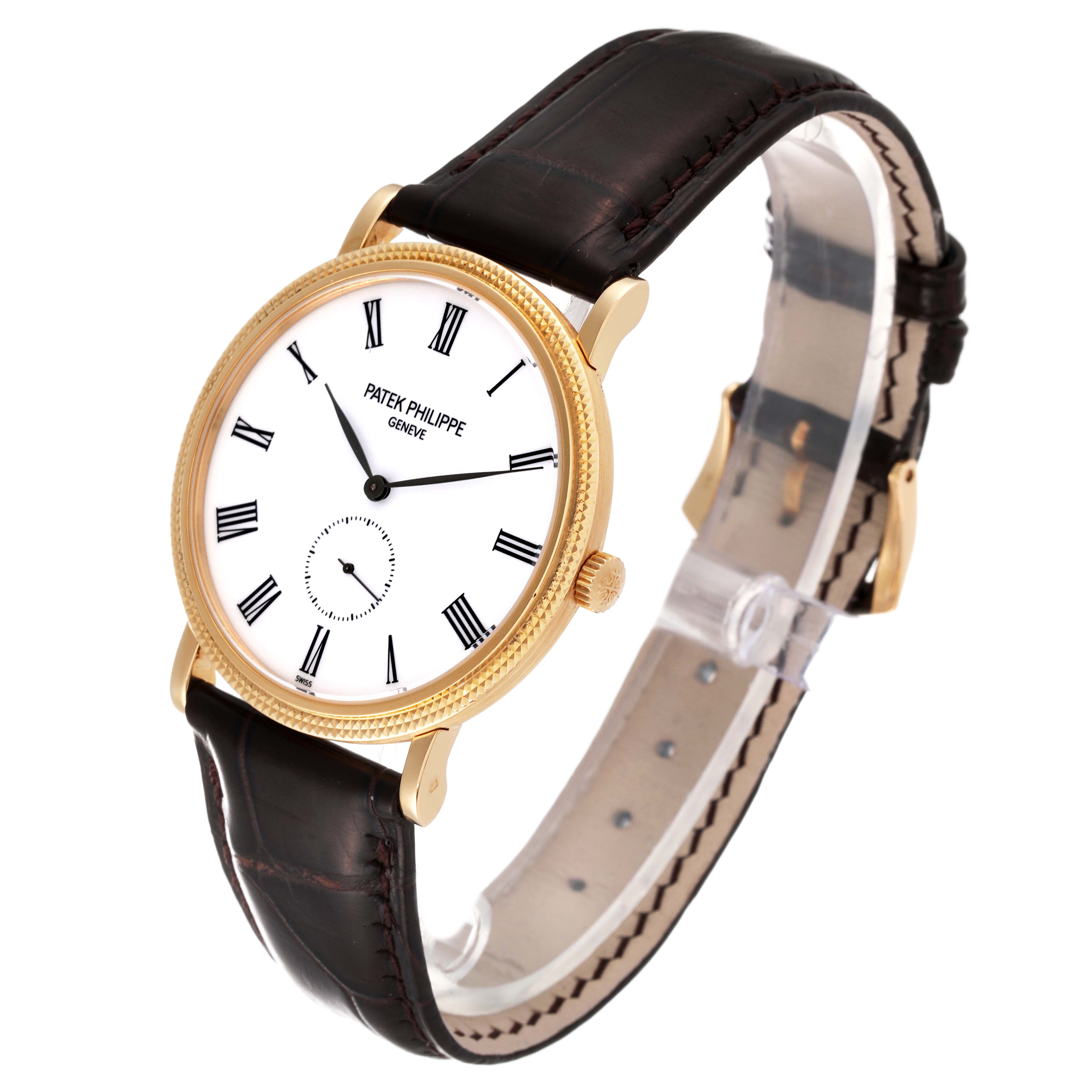 The image shows a side view of the Patek Philippe Calatrava 5119J Men
s Yellow Gold White Dial 5119J Men
s Yellow Gold White Dial watch, highlighting its dial, bezel, crown, and leather strap.