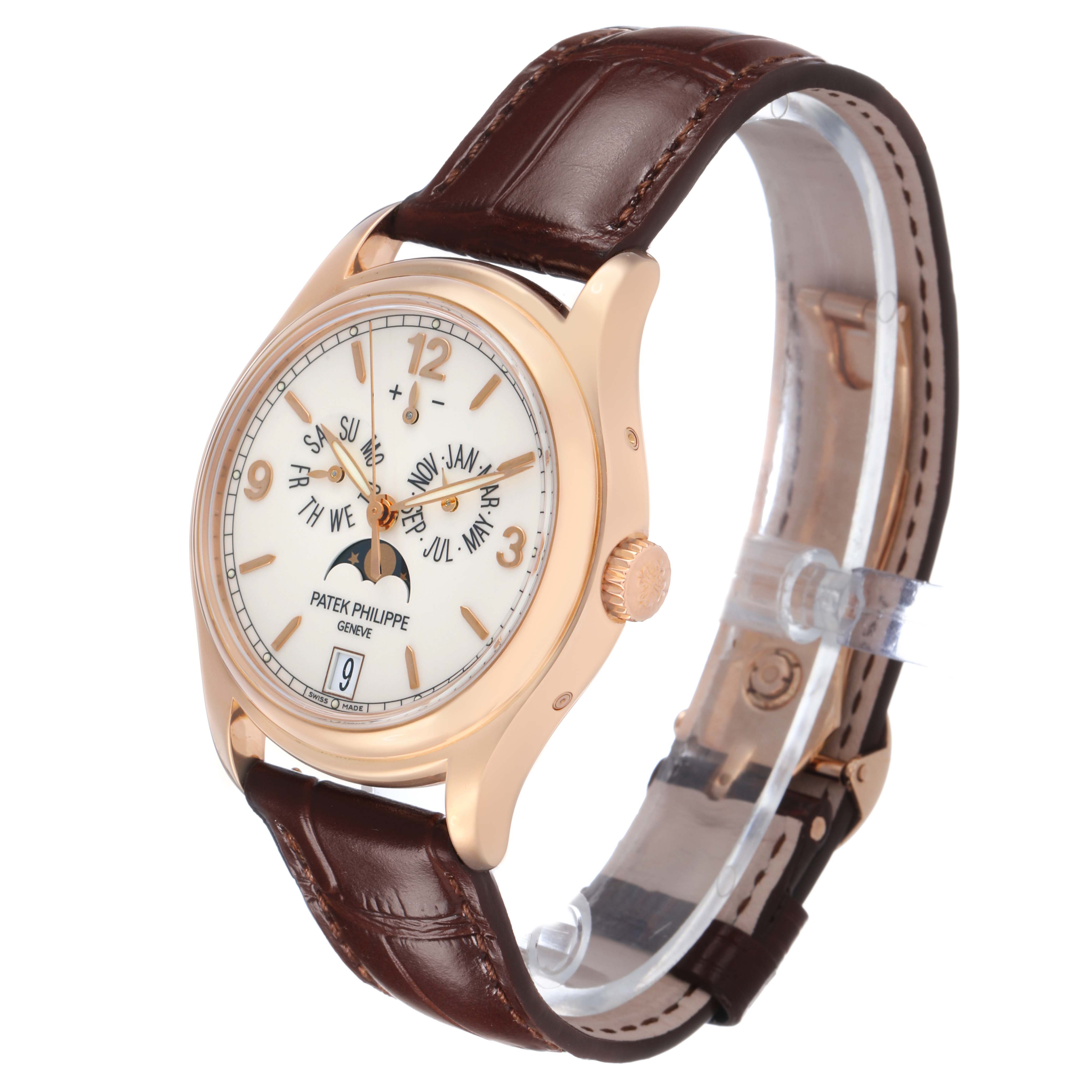 The Patek Philippe Complications 5146R Men's Rose Gold White Dial watch is shown at a three-quarter angle, highlighting the dial, crown, and brown leather strap.
