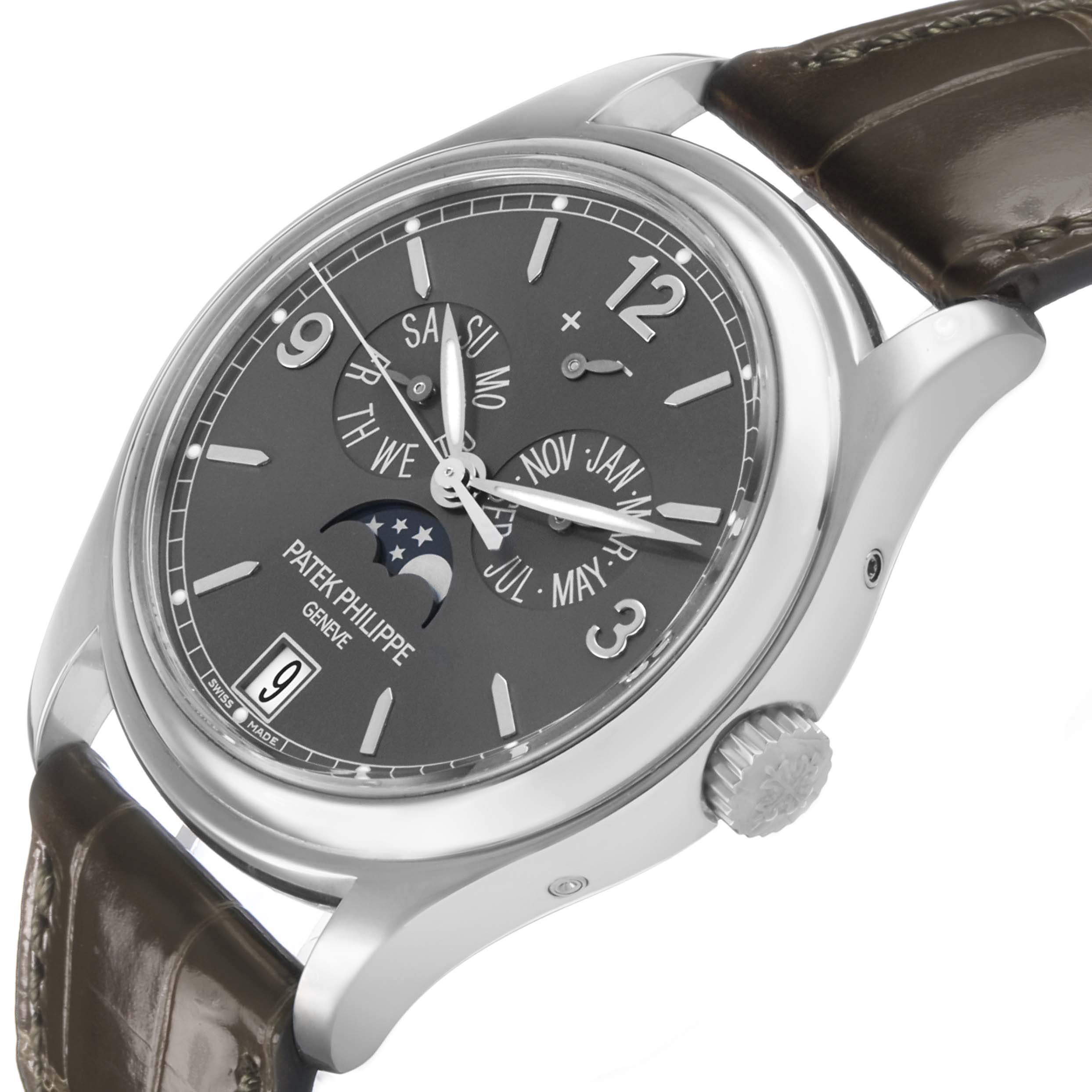 The Patek Philippe Complications 5146G Men's White Gold Grey Dial watch is shown at an angled side view, highlighting the dial, case, crown, and strap.