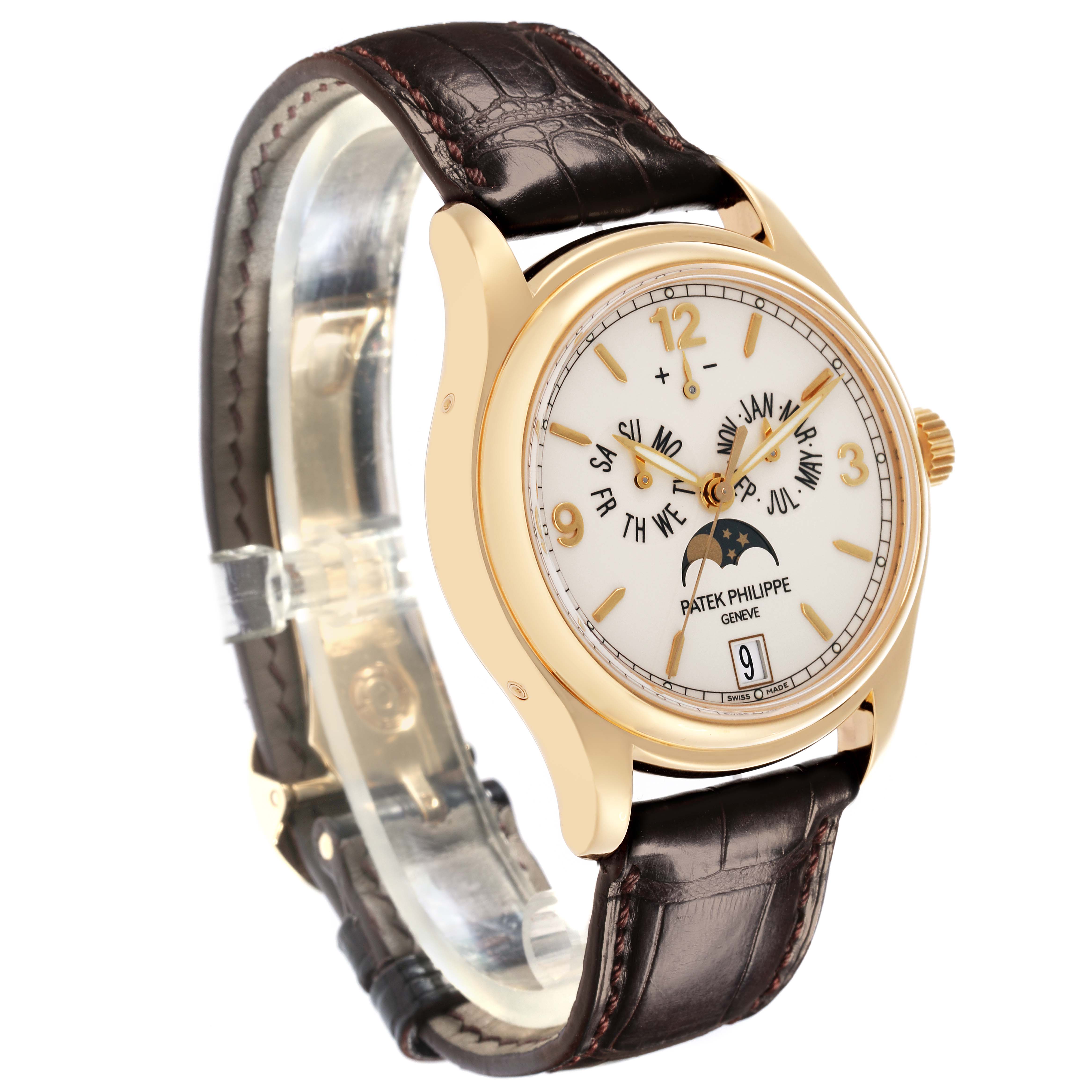 The Patek Philippe Complications 5146J-001 Men's Yellow Gold White Dial 5146J-001 Men's Yellow Gold White Dial watch is shown at a three-quarter angle, highlighting the dial, bezel, crown, and leather strap.